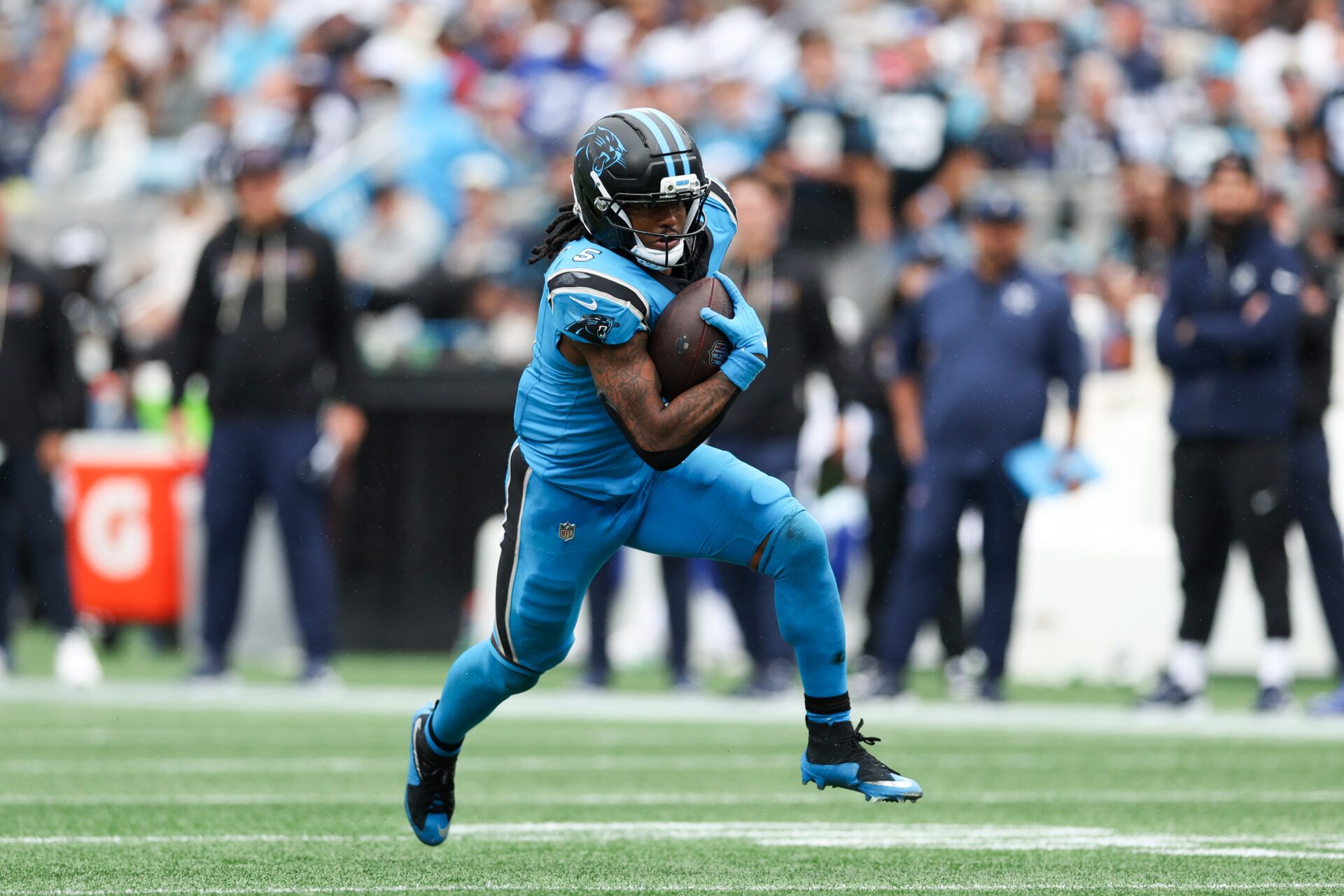 Carolina Panthers running back Rico Dowdle (5) runs with the ball during the second half against the Dallas Cowboys at Bank of America Stadium.