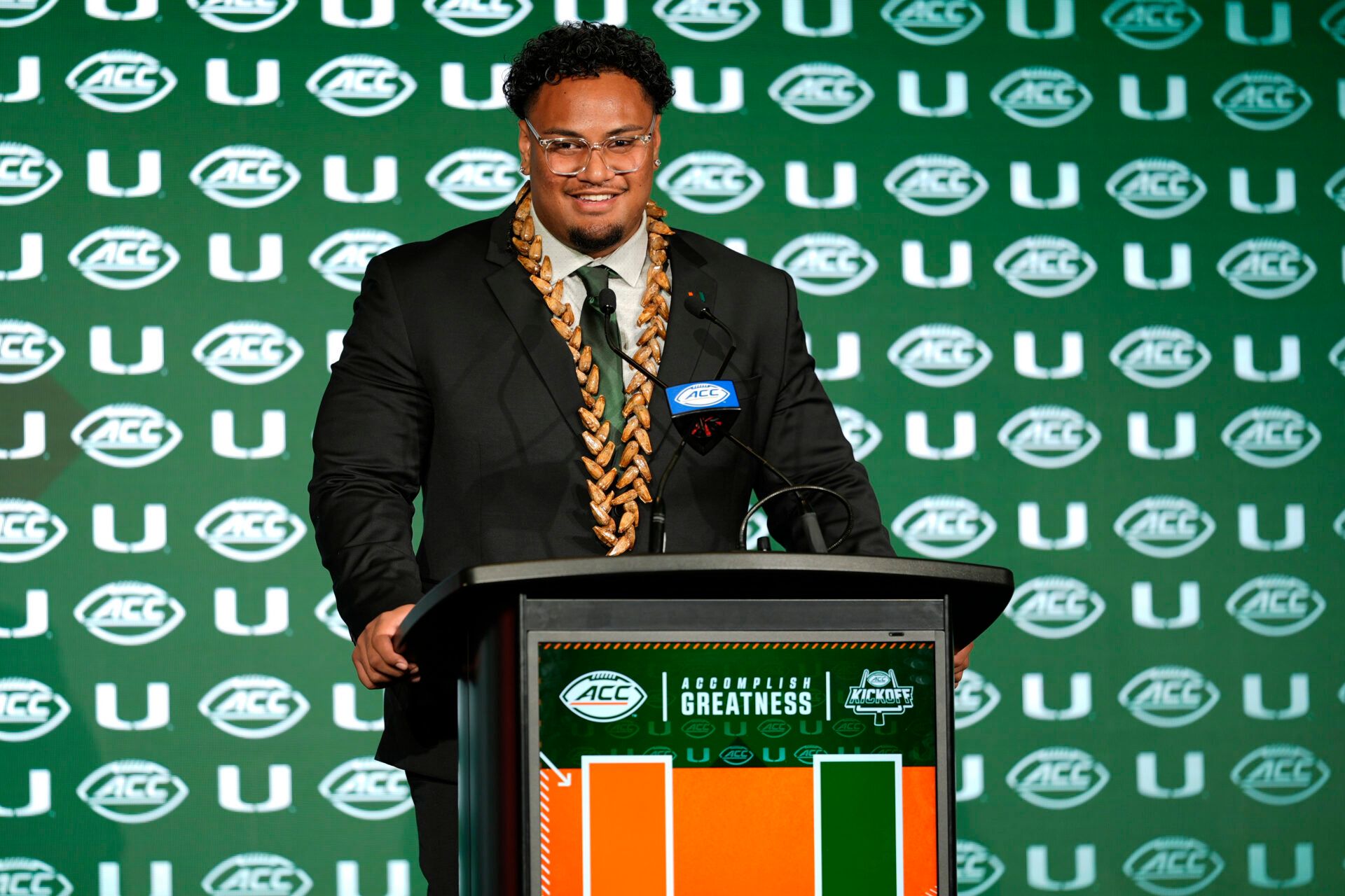 Miami offensive lineman Francis Mauigoa, Jr answers questions from the media during ACC Media Days at Hilton Charlotte Uptown.