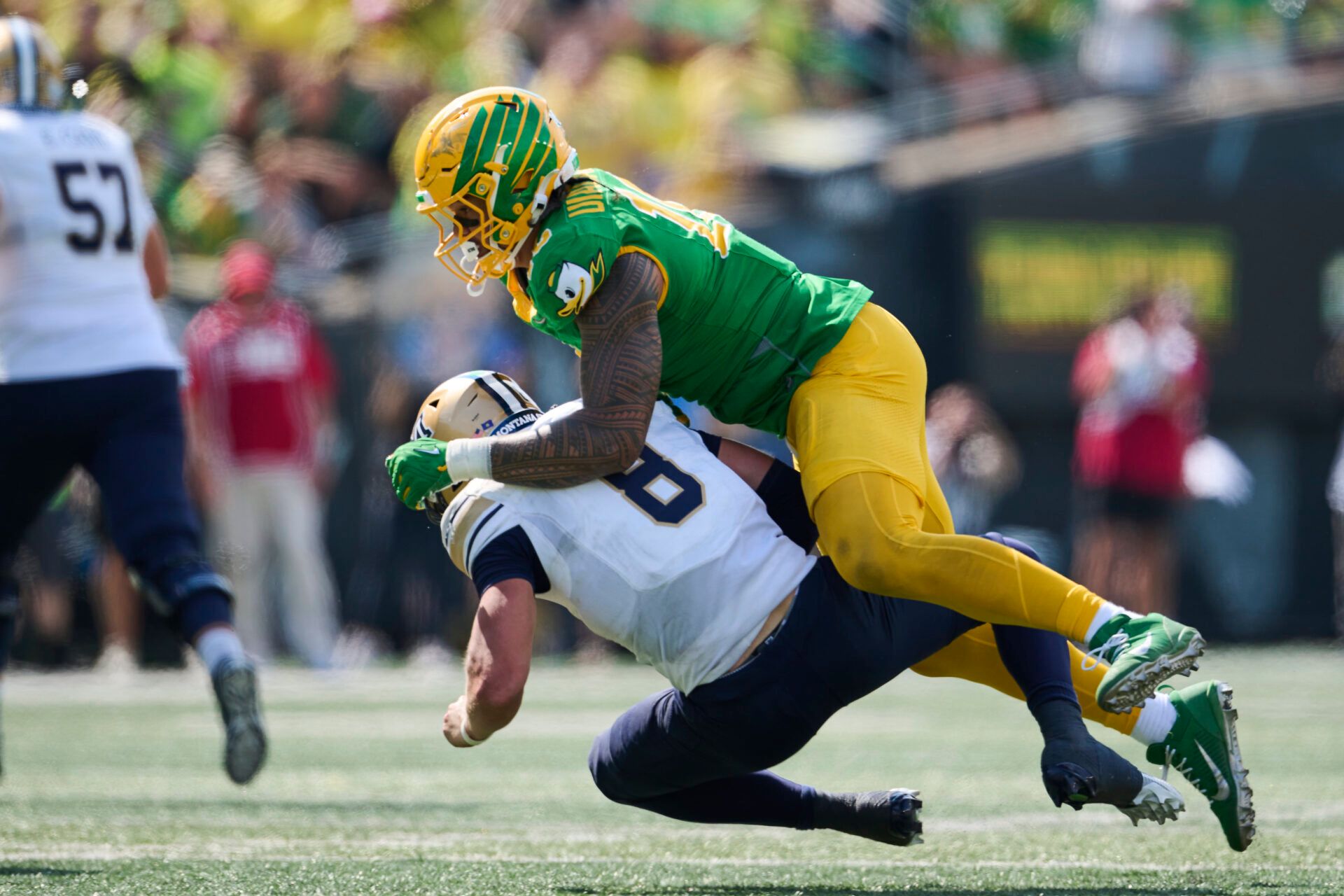 Oregon Ducks linebacker Matayo Uiagalelei (10) sacks Montana State Bobcats quarterback Justin Lamson (8) during the second half at Autzen Stadium.