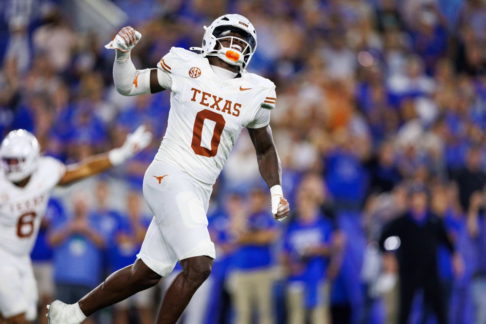 Texas Longhorns linebacker Anthony Hill Jr. (0) celebrates after the Kentucky Wildcats fail to score in overtime at Kroger Field.