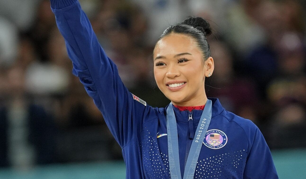 France; Sunisa Lee of the United States reacts after winning the bronze medal on the second day of gymnastics event finals during the Paris 2024 Olympic Summer Games at Bercy Arena.