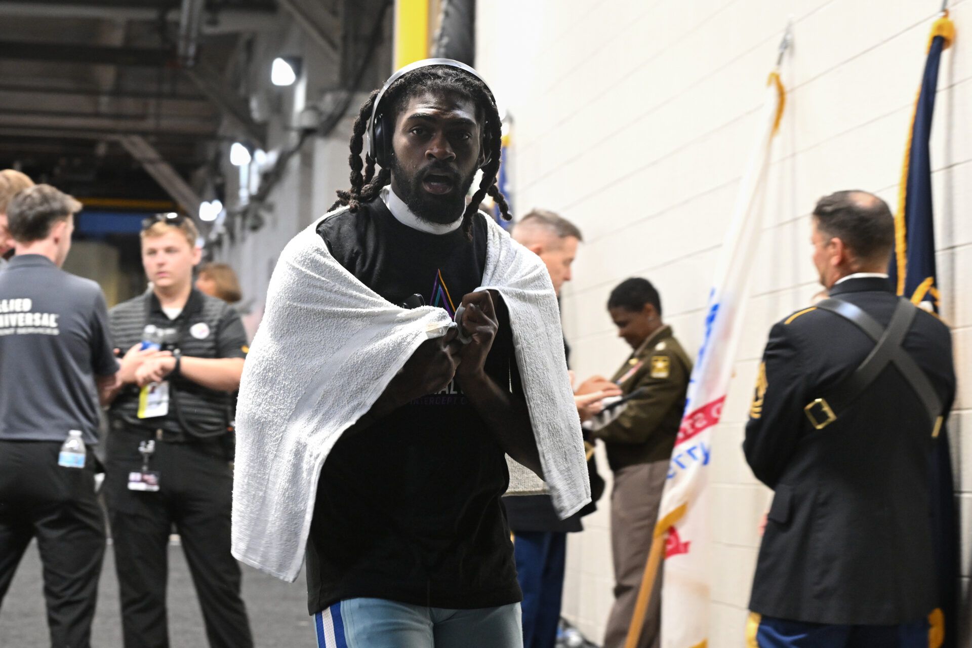 Dallas Cowboys cornerback Trevon Diggs (7) walks out to see the field during a weather delay before the game between the Pittsburgh Steelers and Dallas Cowboys at Acrisure Stadium.