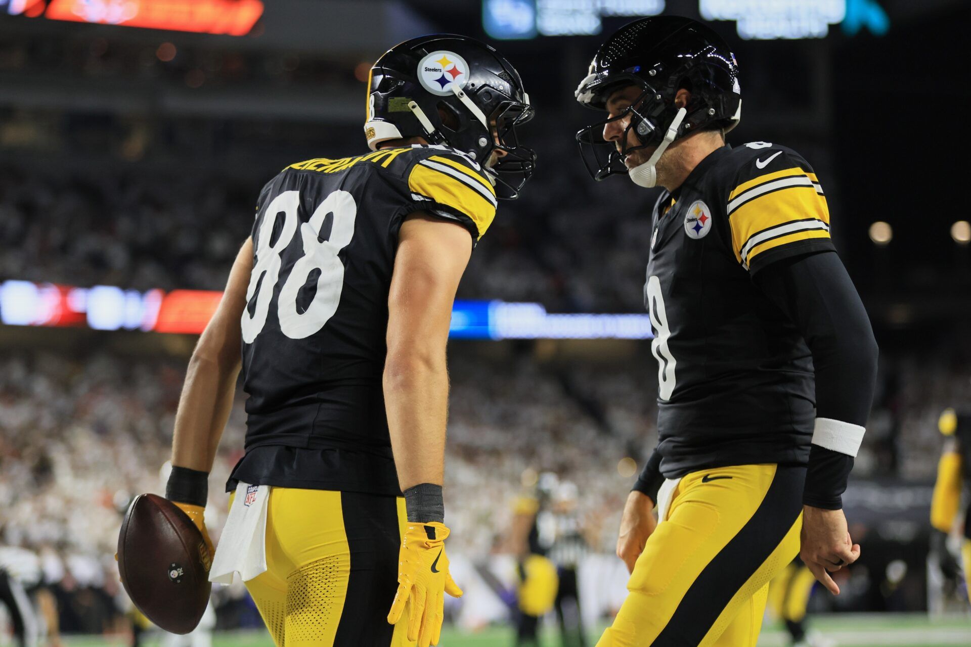 Pittsburgh Steelers tight end Pat Freiermuth (88) celebrates with quarterback Aaron Rodgers (8) after scoring a touchdown against the Cincinnati Bengals during the third quarter at Paycor Stadium.