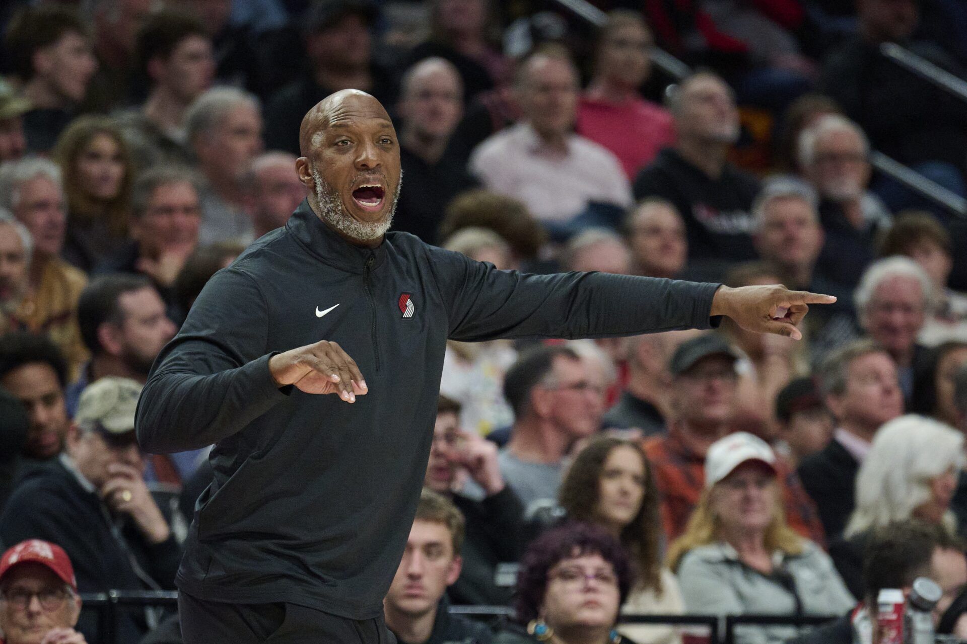 Portland Trail Blazers head coach Chauncey Billups calls out a play during the first half against the Memphis Grizzlies at Moda Center.