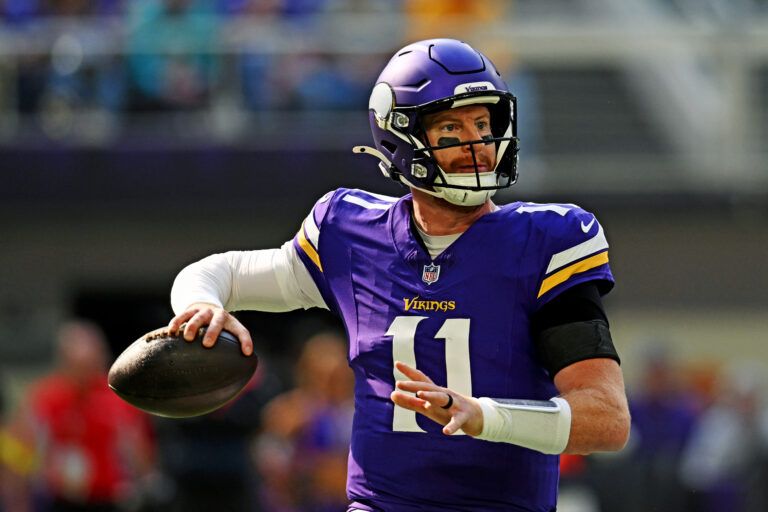 Minnesota Vikings quarterback Carson Wentz (11) makes a pass during the first half against the Philadelphia Eagles at U.S. Bank Stadium.