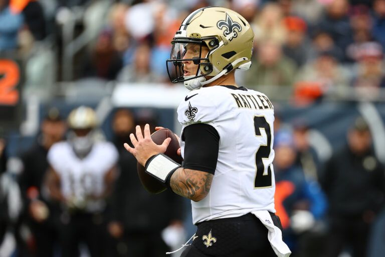New Orleans Saints quarterback Spencer Rattler (2) drops back to pass against the Chicago Bears during the second half at Soldier Field.