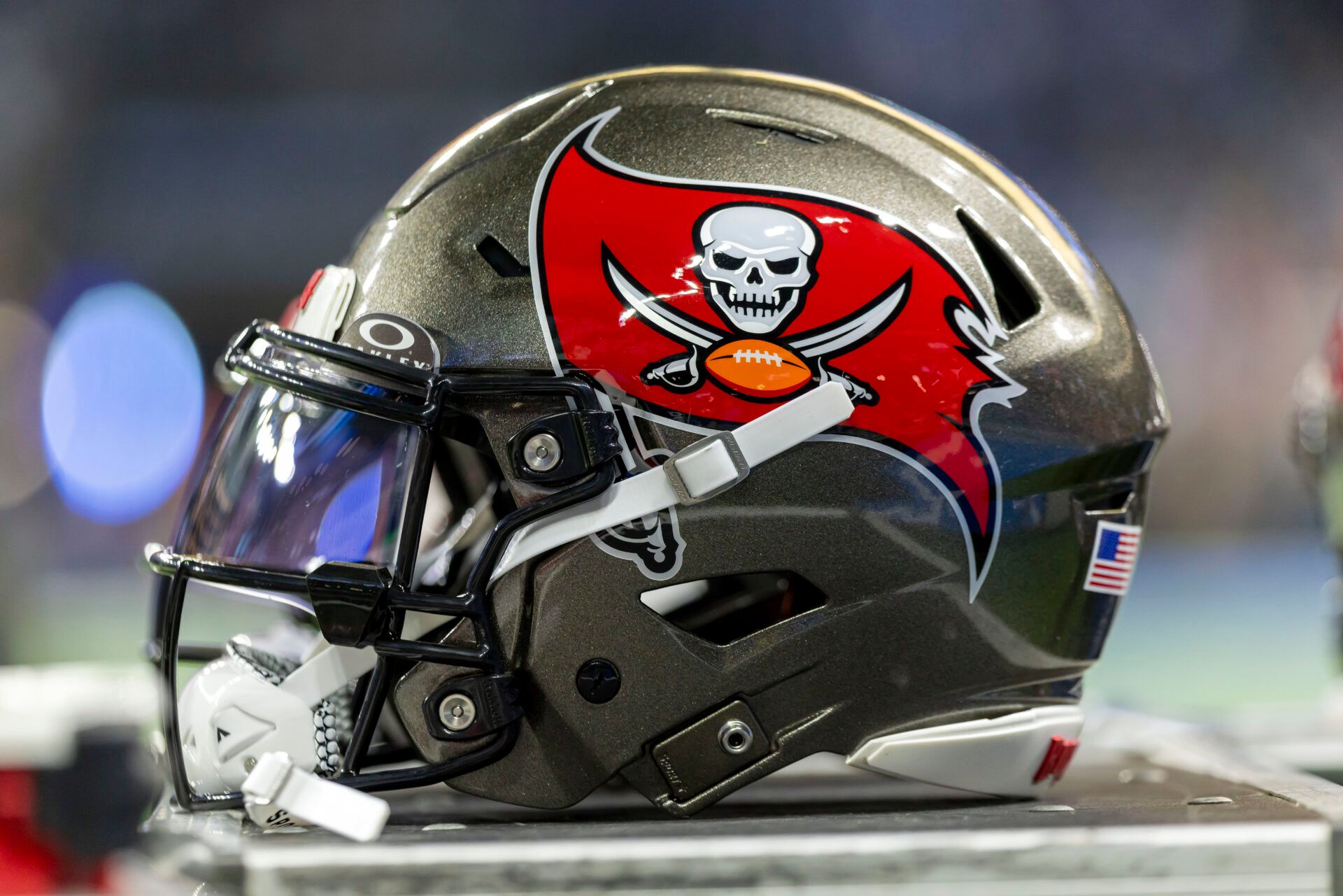 The Tampa Bay Buccaneers helmet sits on an equipment locker before the game at Ford Field.