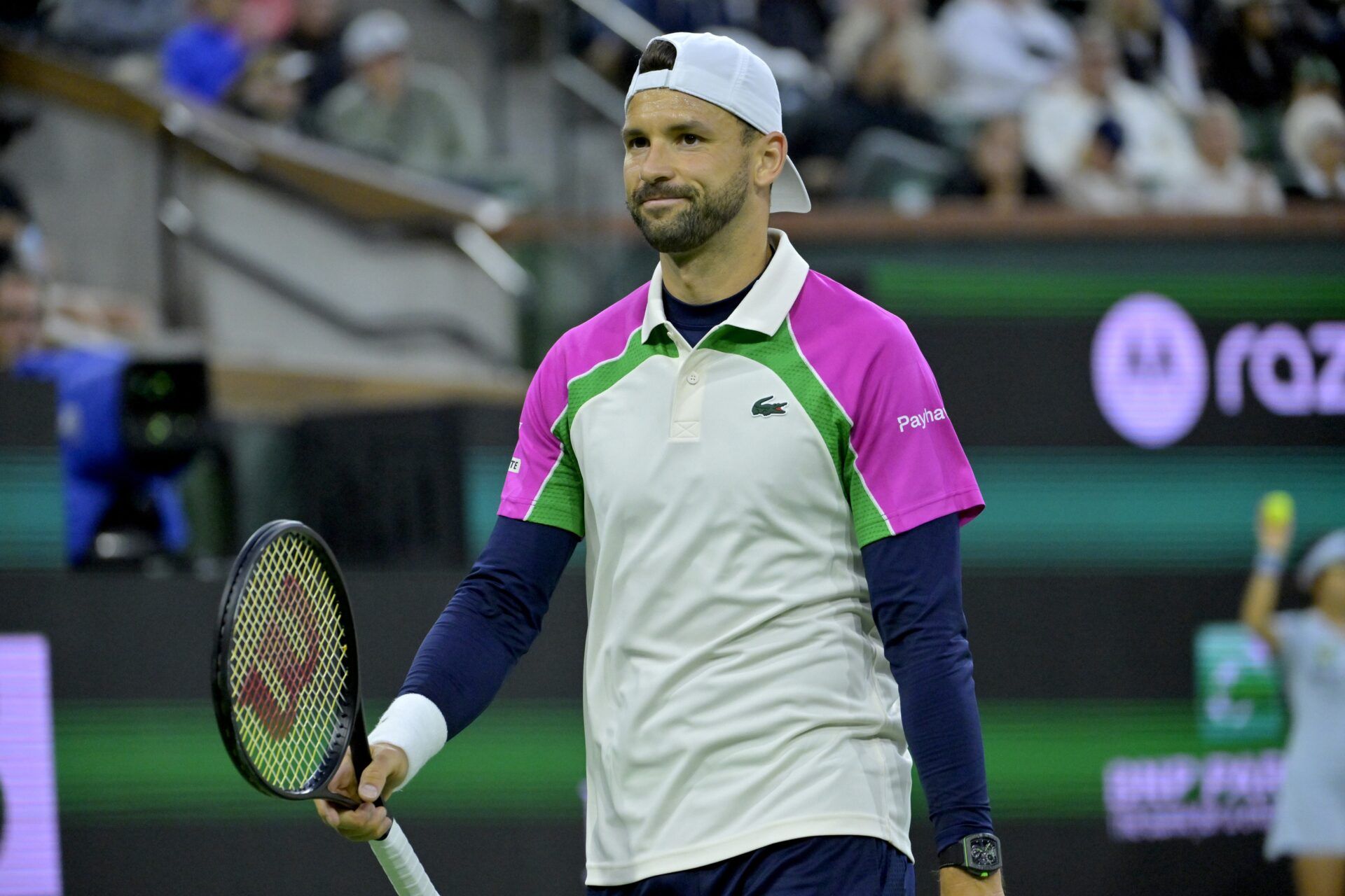 Grigor Dimitrov (BUL) reacts after missing a shot against Carlos Alcaraz (not pictured) in the fourth round of the BNP Paribas Open at the Indian Well Tennis Garden.