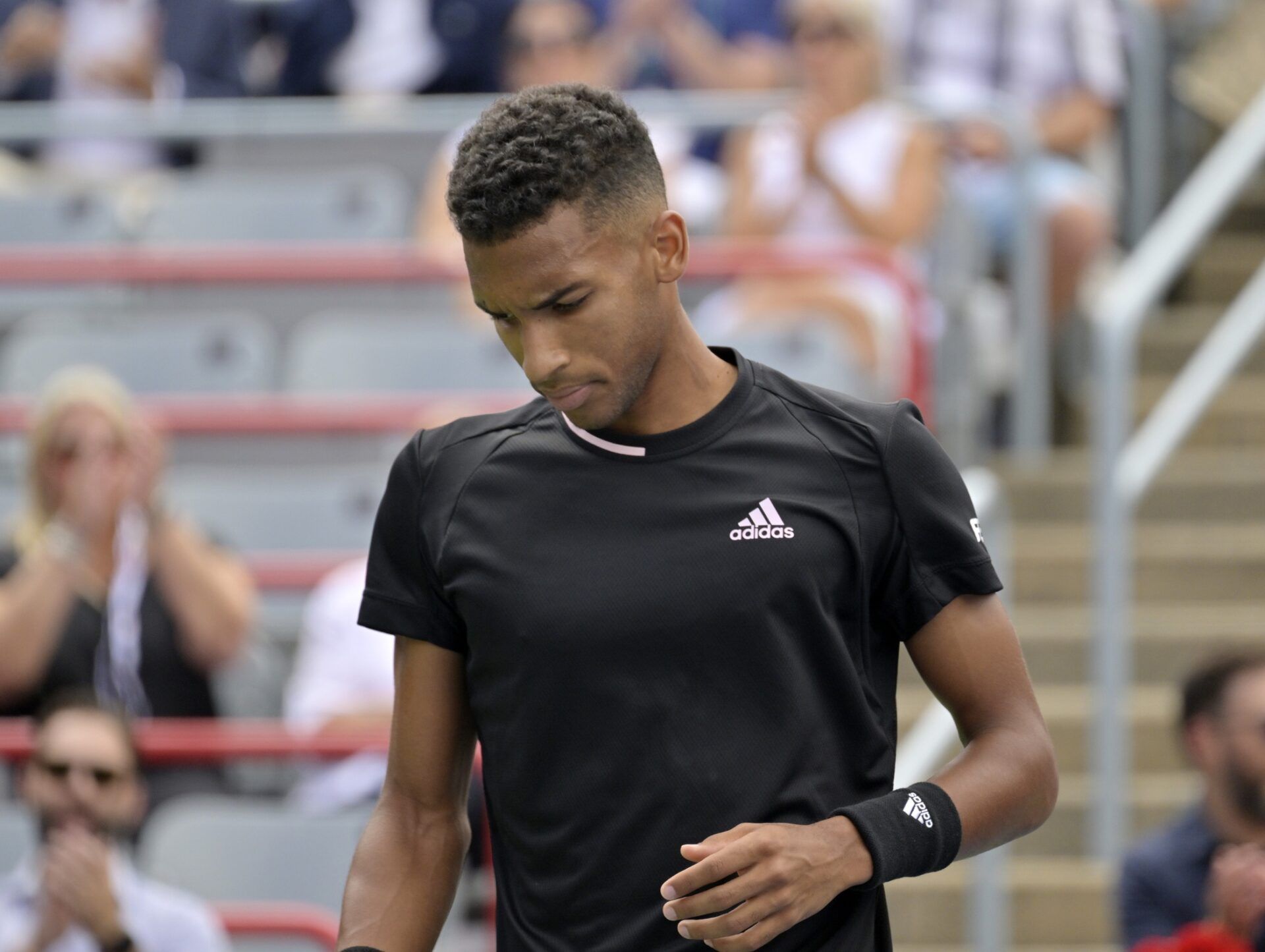 Felix Auger-Aliassime (CAN) gestures during his match against Casper Ruud (NOR) (not pictured) in quarterfinal play in the National Bank Open at IGA Stadium.