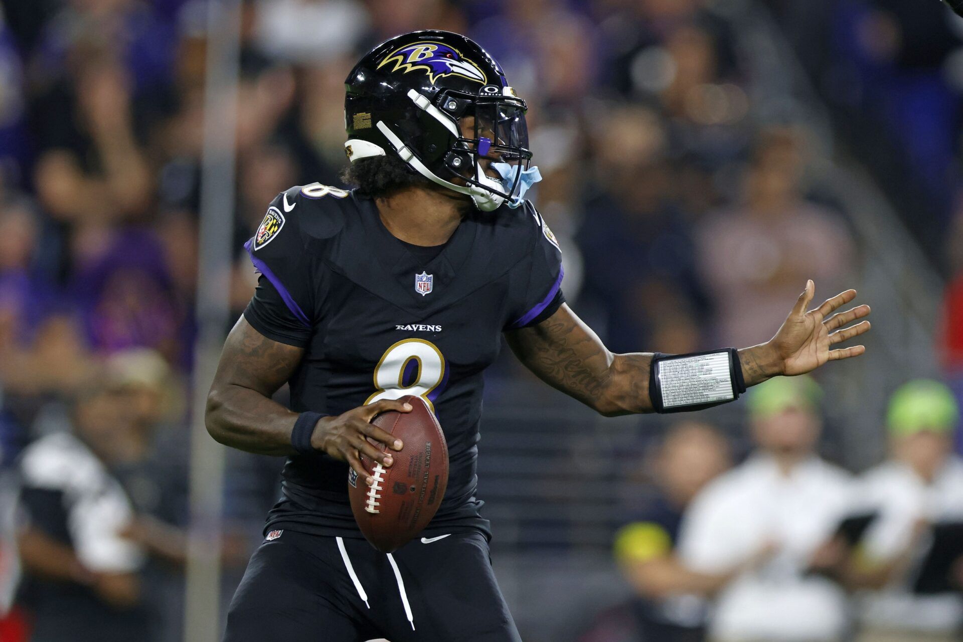 Baltimore Ravens quarterback Lamar Jackson (8) drops back to pass against the Detroit Lions during the first half at M&T Bank Stadium.