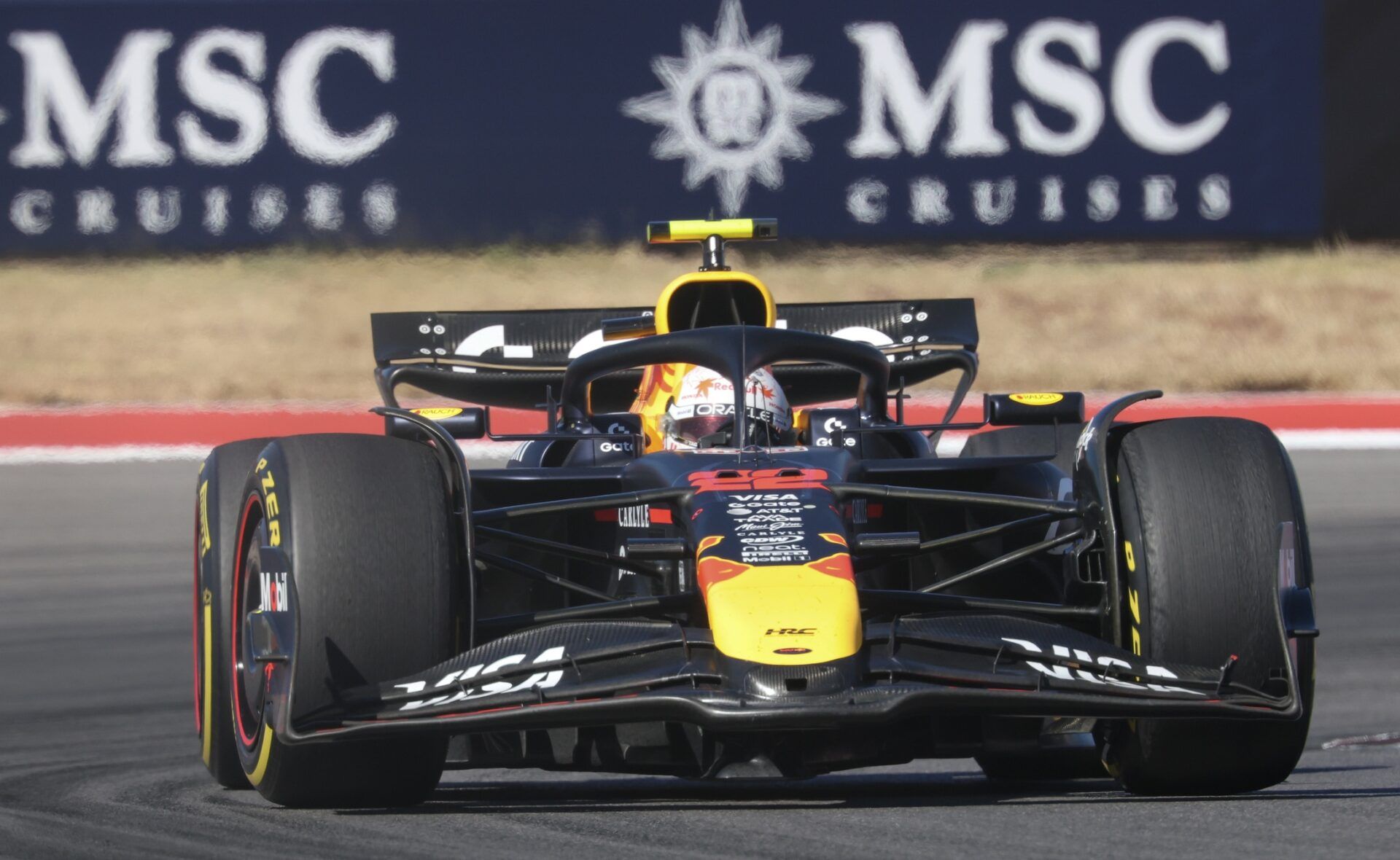 Oracle Red Bull Racing driver Yuki Tsunoda (22) of Team Japan out of turn 20 at Circuit of The Americas Austin.