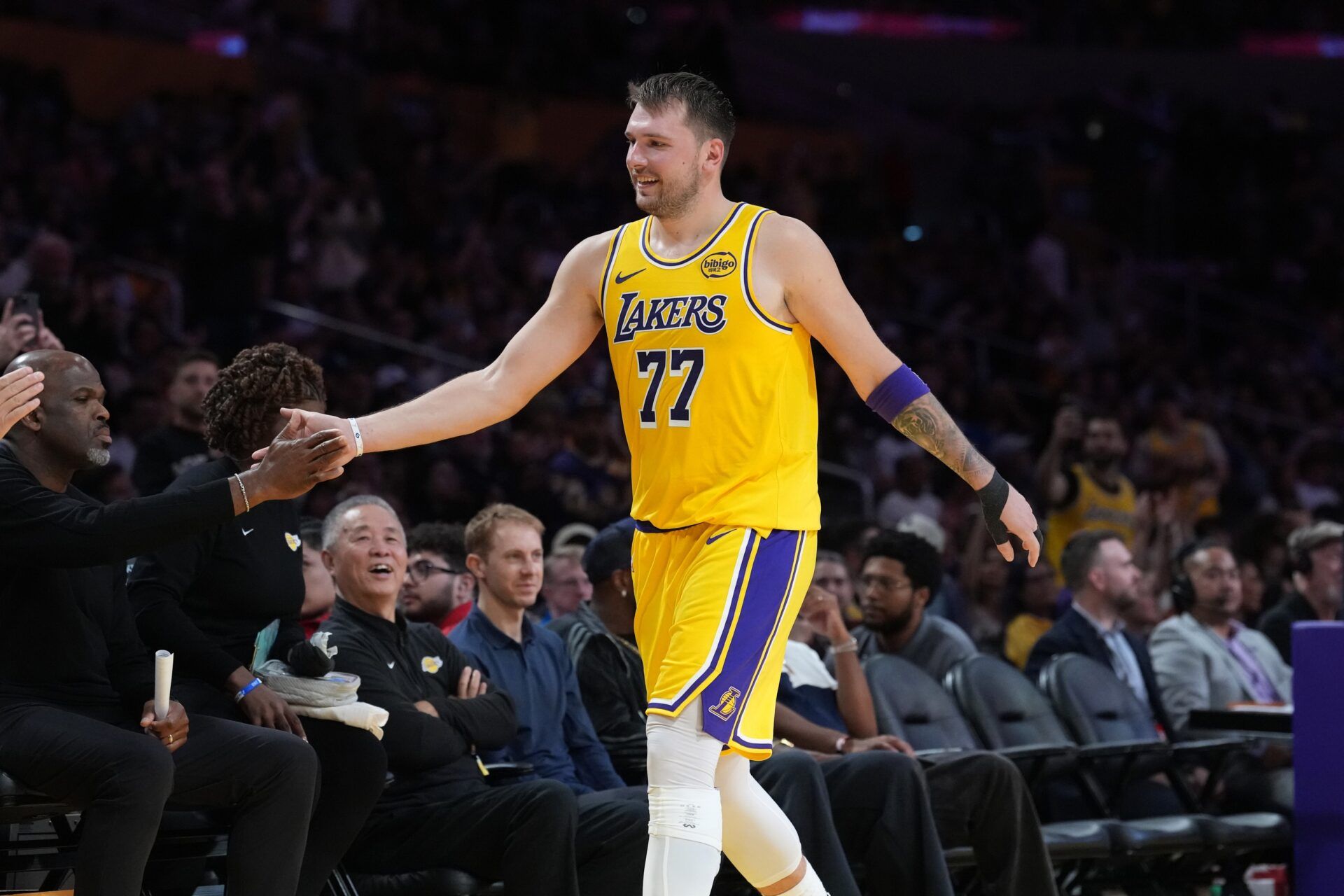 Los Angeles Lakers guard Luka Doncic (77) returns to the be3nch in the fourth quarteragainst the Minnesota Timberwolves at Crypto.com Arena.