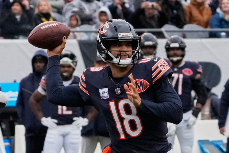 Chicago Bears quarterback Caleb Williams (18) throws a pass against the New Orleans Saints during the first half at Soldier Field.