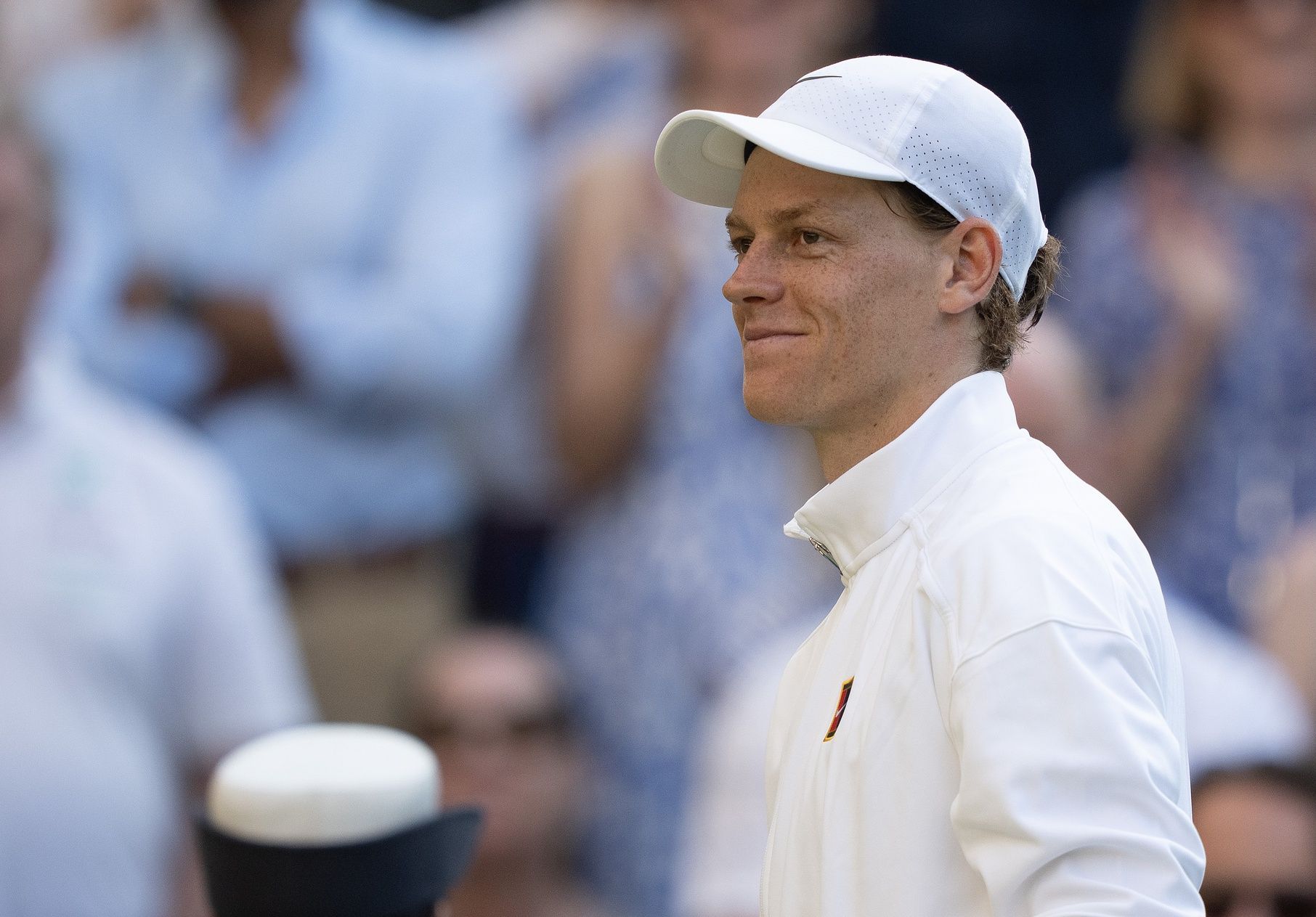 Jannik Sinner of Italy at his post match interview after winning his match against Novak Djokovic of Serbia on day 12 at All England Lawn Tennis and Croquet Club.