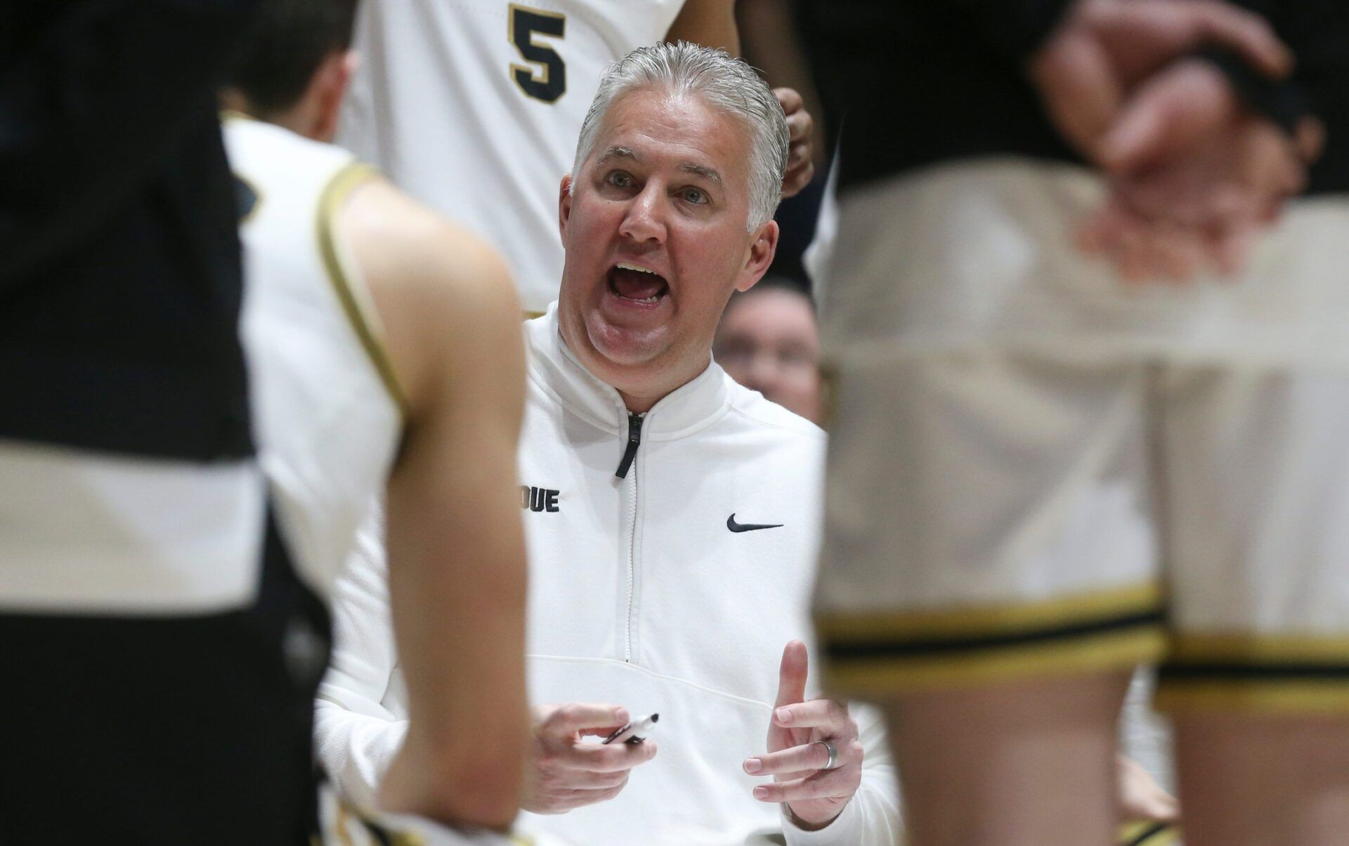 Purdue Boilermakers head coach Matt Painter leads a team huddle Sunday, Dec. 8, 2024, during the NCAA men’s basketball game against the Maryland Terrapins at Mackey Arena in West Lafayette, Ind.