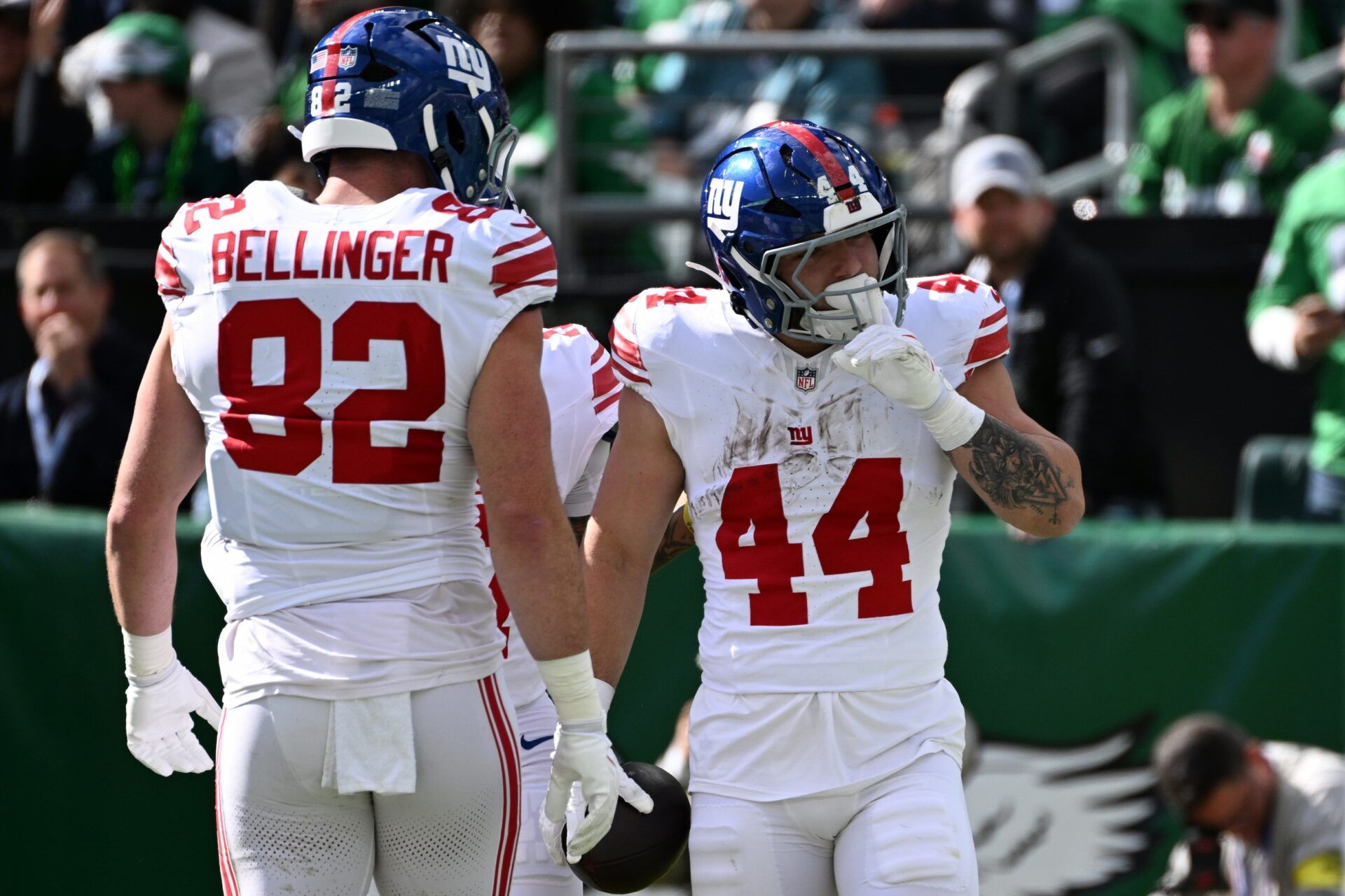 New York Giants running back Cam Skattebo (44) celebrates with tight end Daniel Bellinger (82) after scoring a touchdown against the Philadelphia Eagles in the first quarter at Lincoln Financial Field.