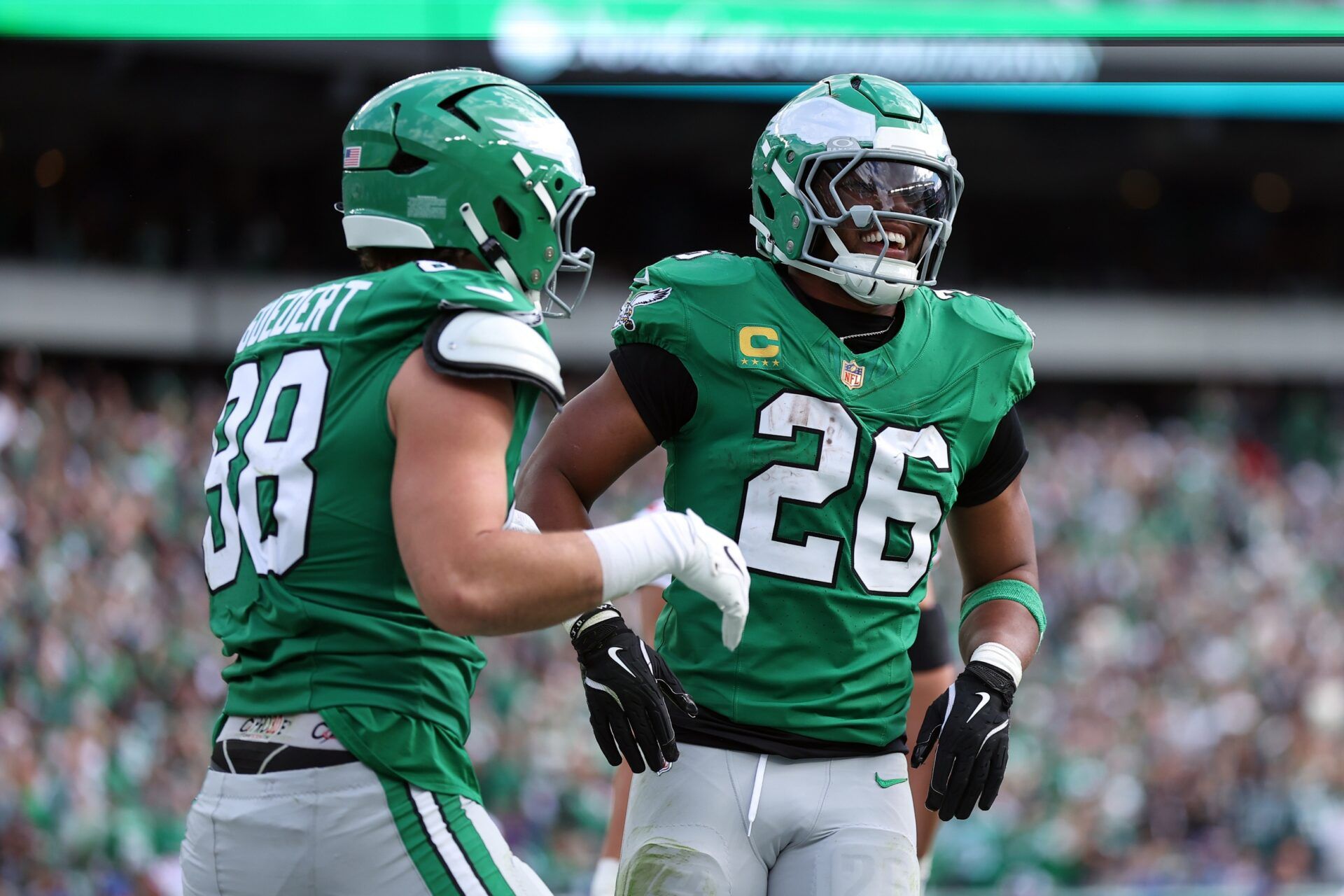 Philadelphia Eagles tight end Dallas Goedert (88) celebrates scoring a touchdown with running back Saquon Barkley (26) in the second quarter against the New York Giants at Lincoln Financial Field.