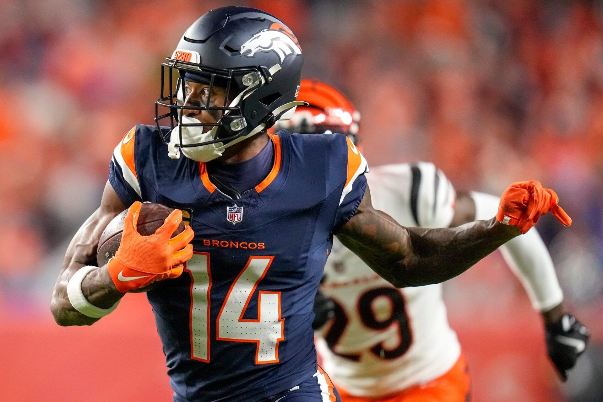 Denver Broncos wide receiver Courtland Sutton (14) runs with a catch in the second quarter of the NFL Week 4 Monday Night Football game between the Denver Broncos and the Cincinnati Bengals at Empower Field at Mile High in Denver on Monday, Sept. 29, 2025.