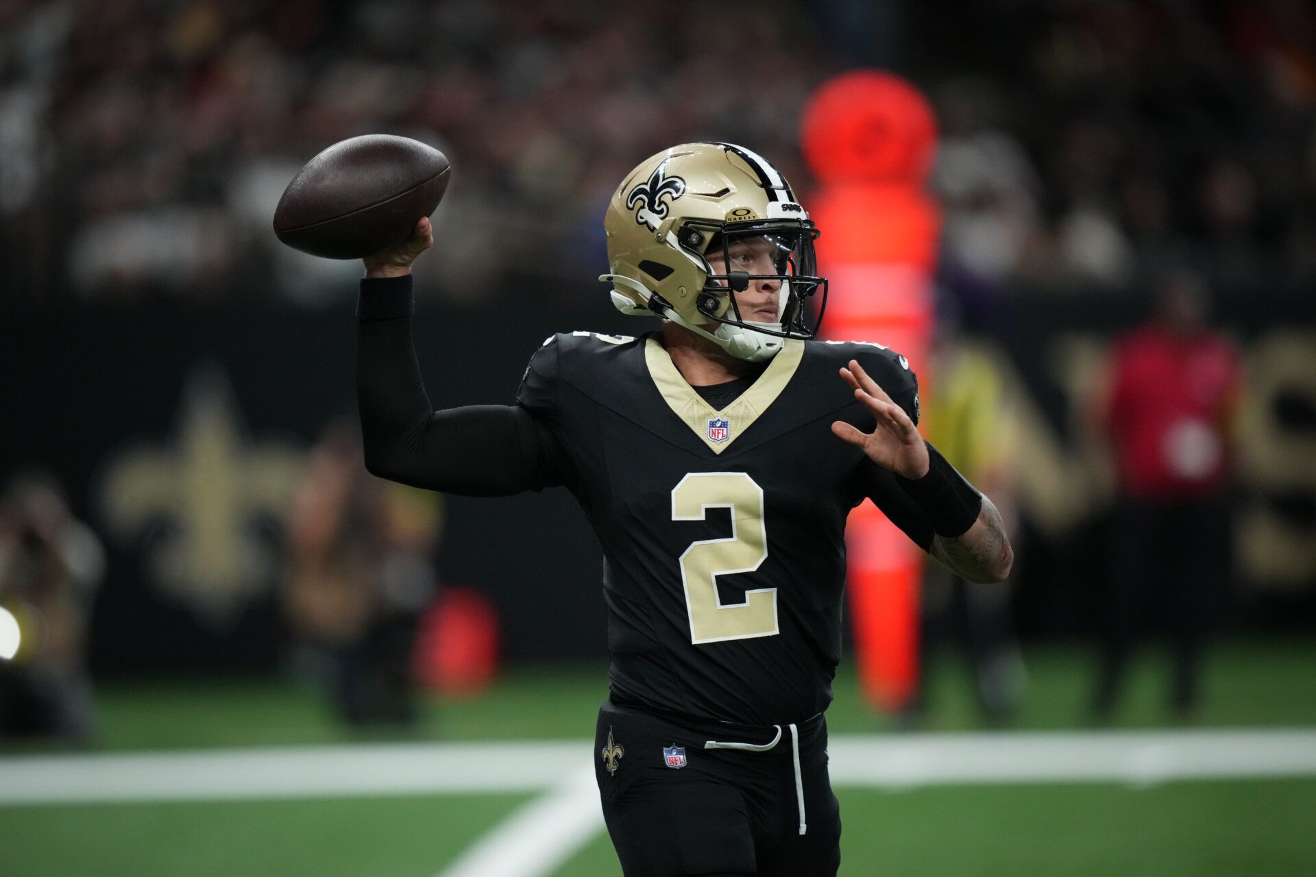 New Orleans Saints quarterback Spencer Rattler (2) throws downfield during the first quarter against the Tampa Bay Buccaneers at Caesars Superdome.