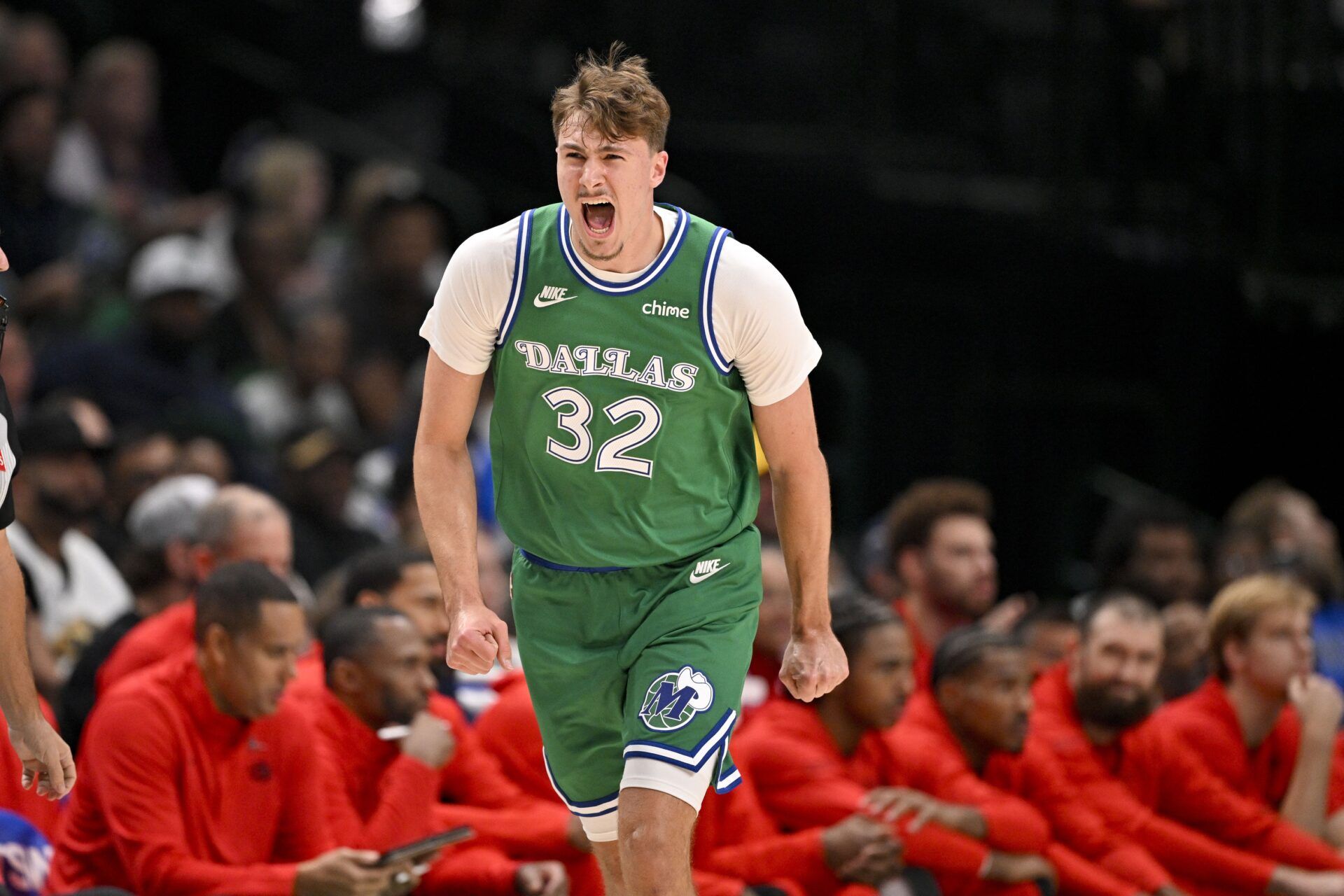 Dallas Mavericks forward Cooper Flagg (32) celebrates during the first quarter against the Toronto Raptors at the American Airlines Center.