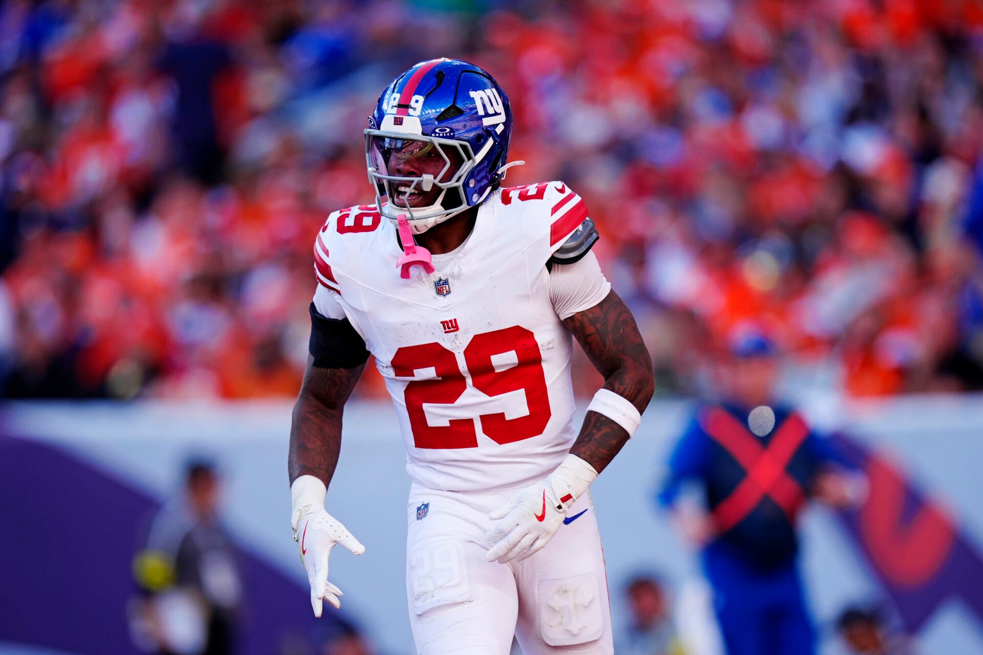 New York Giants running back Tyrone Tracy Jr. (29) reacts after a play during the second half against the Denver Broncos at Empower Field at Mile High.