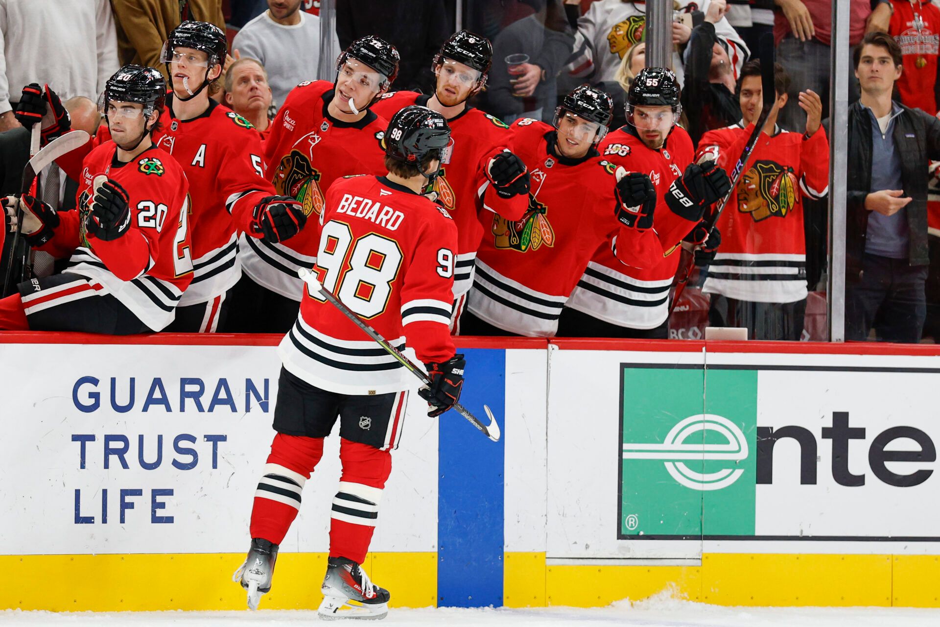 Chicago Blackhawks center Connor Bedard (98) celebrates with teammates after scoring against the Los Angeles Kings during the first period at United Center.