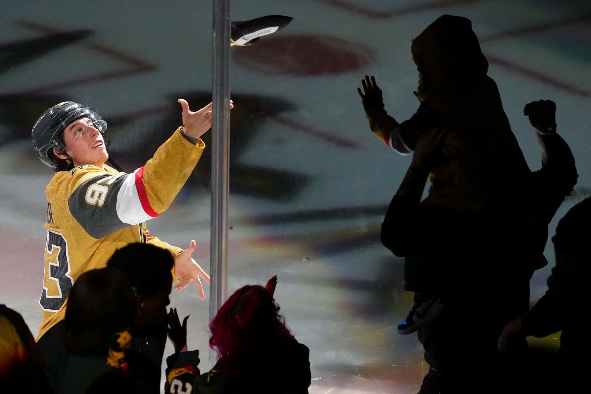 Vegas Golden Knights right wing Mitch Marner (93) tosses a souvenir to a fan after the Golden Knights defeated the Calgary Flames 6-1 at T-Mobile Arena.