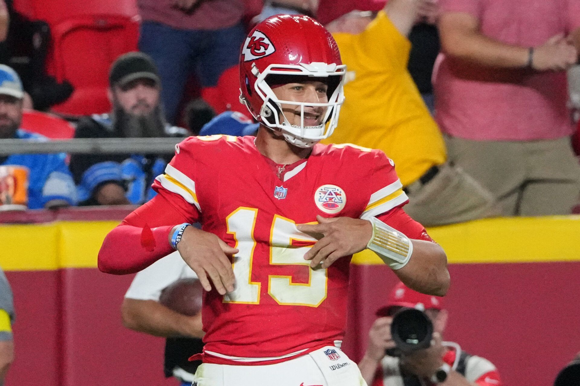 Kansas City Chiefs quarterback Patrick Mahomes (15) reacts after a touchdown against the Detroit Lions during the first half at GEHA Field at Arrowhead Stadium.