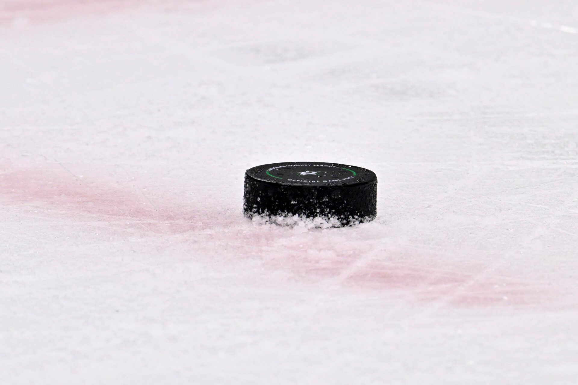 A view of an NHL puck with logo during the game between the Dallas Stars and the Winnipeg Jets in game three of the second round of the 2025 Stanley Cup Playoffs at American Airlines Center.