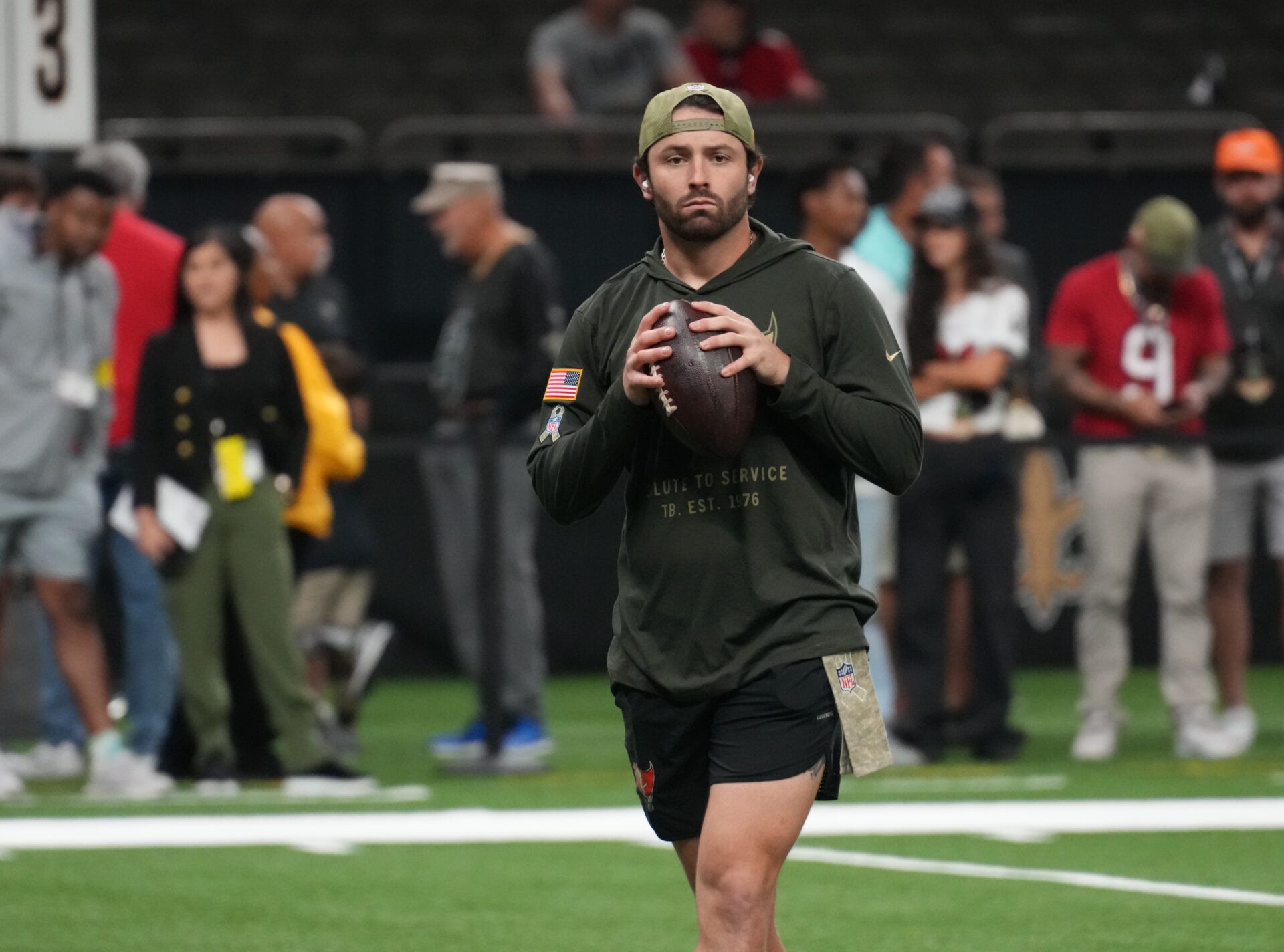 Tampa Bay Buccaneers quarterback Baker Mayfield (6) warms up before a game against the New Orleans Saints at Caesars Superdome.