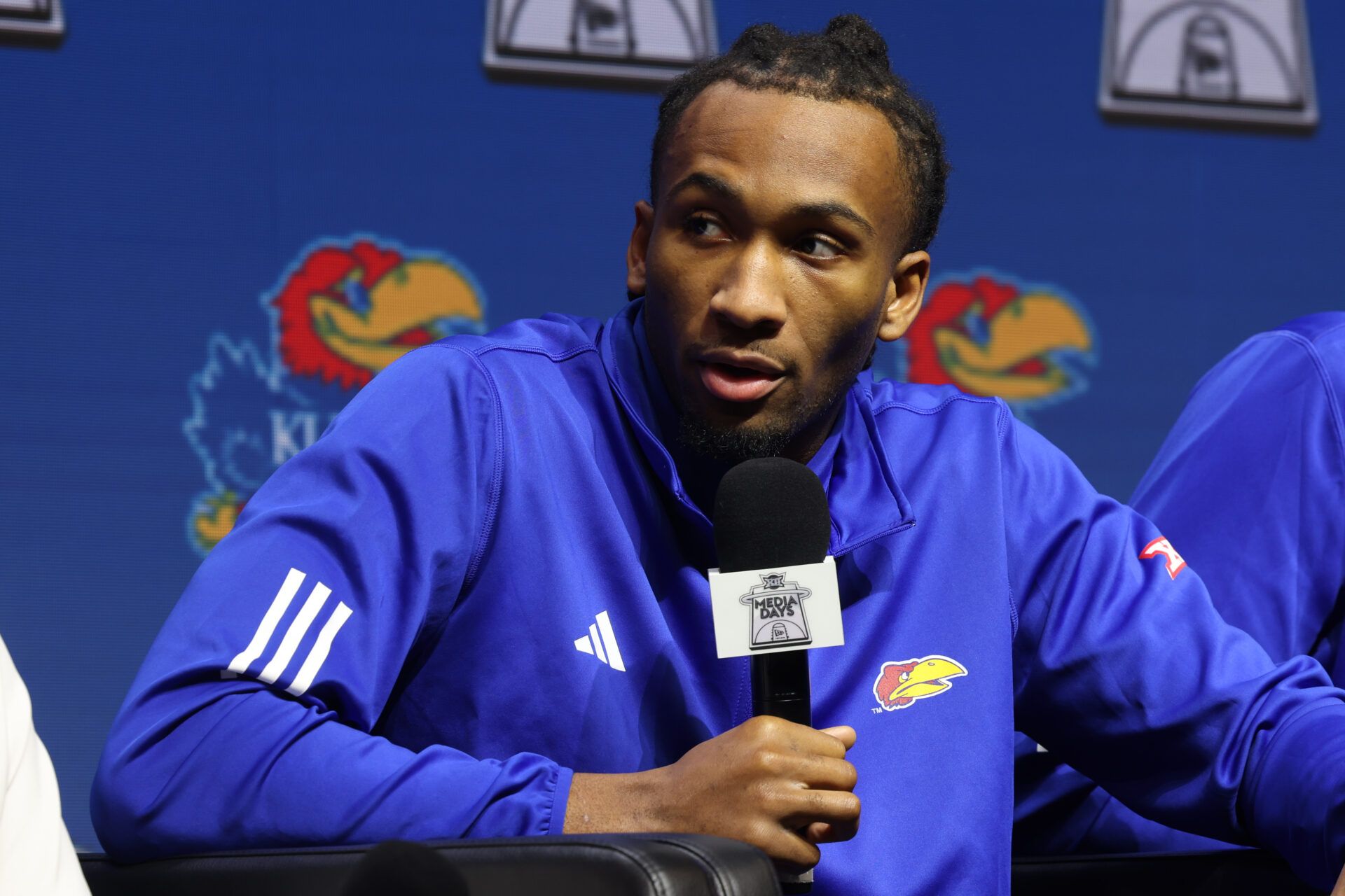 Kansas guard Darryn Peterson speaks to media during Big 12 Mens Basketball media day at T-Mobile Center.