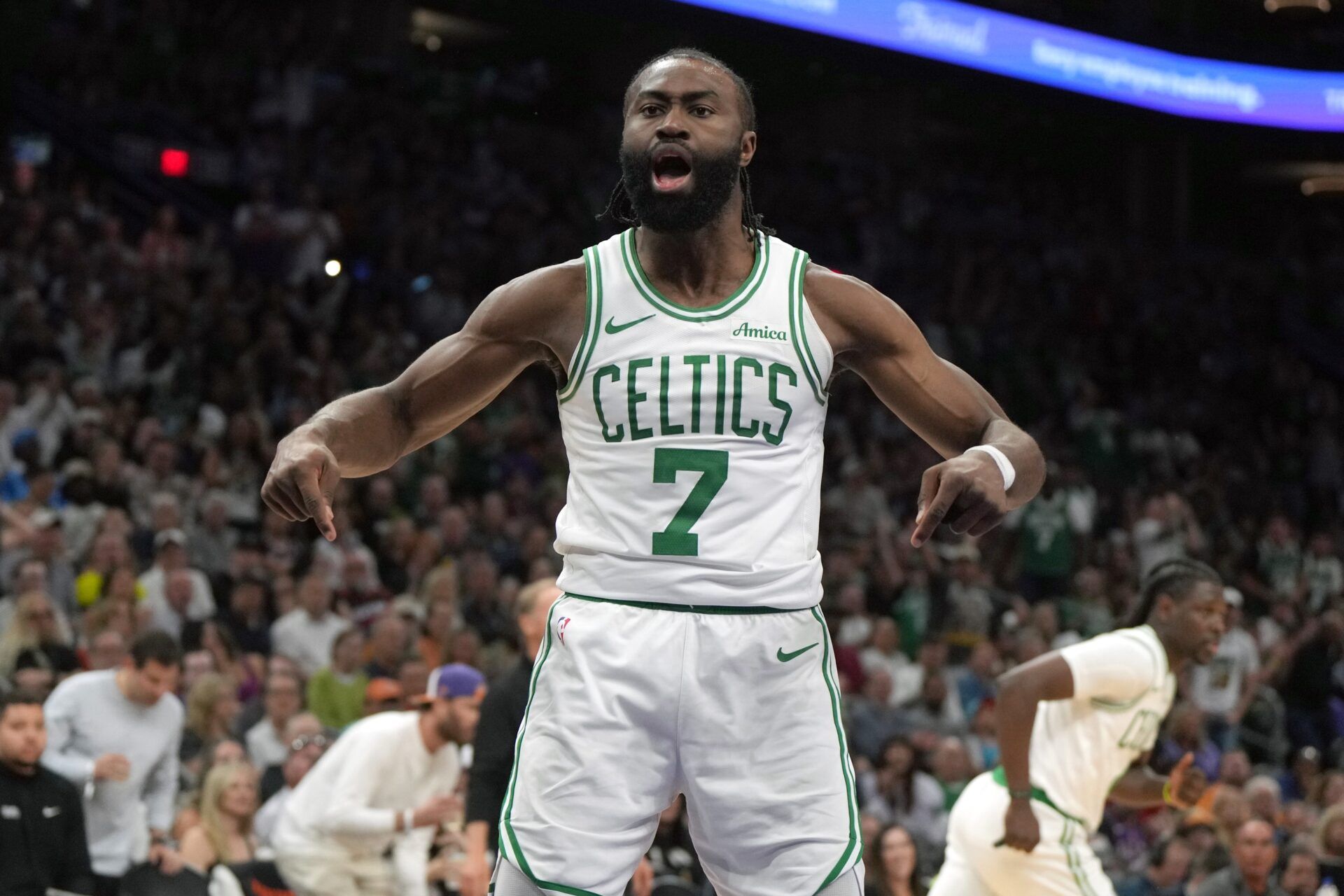 Boston Celtics guard Jaylen Brown (7) reacts after scoring against the Phoenix Suns during the second half at Footprint Center.