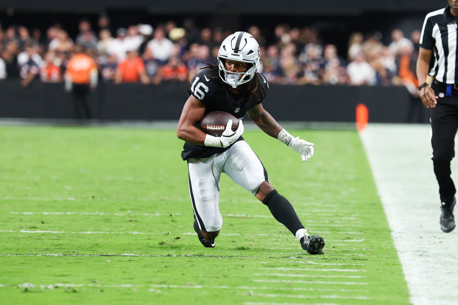 Las Vegas Raiders wide receiver Jakobi Meyers (16) runs the ball during the second half against the Chicago Bears at Allegiant Stadium.