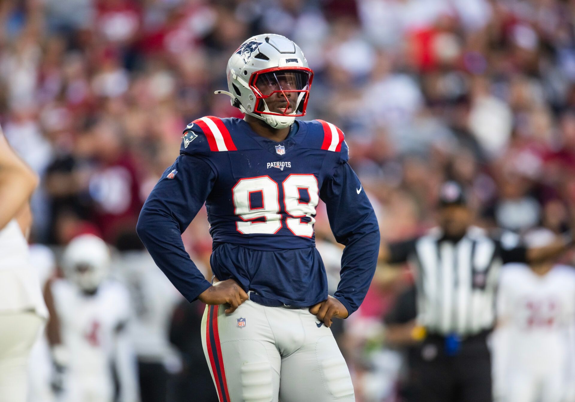 New England Patriots defensive end Keion White (99) against the Arizona Cardinals at State Farm Stadium.