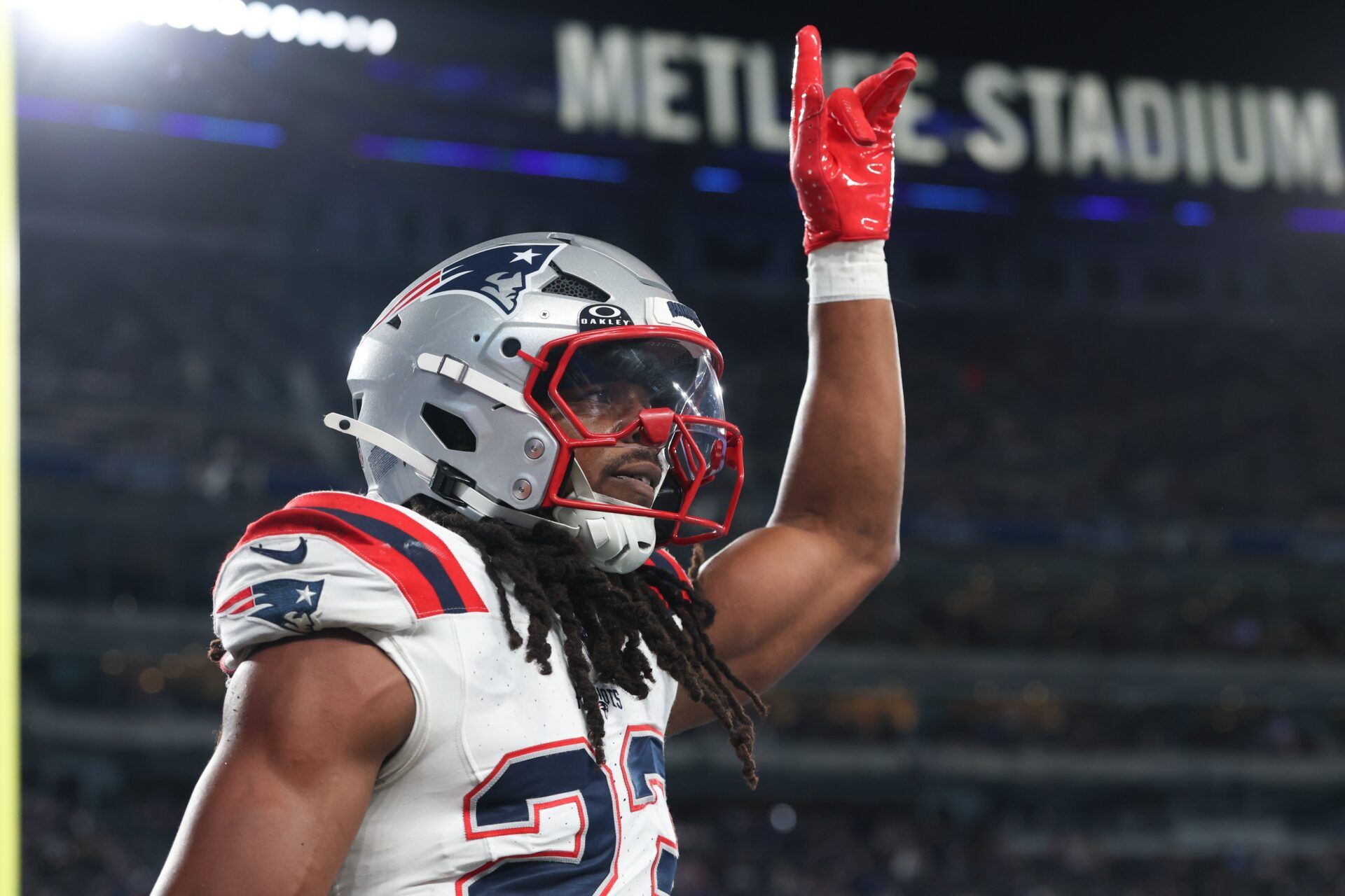 New England Patriots safety Kyle Dugger (23) reacts after intercepting a pass during the first half against the New York Giants at MetLife Stadium.
