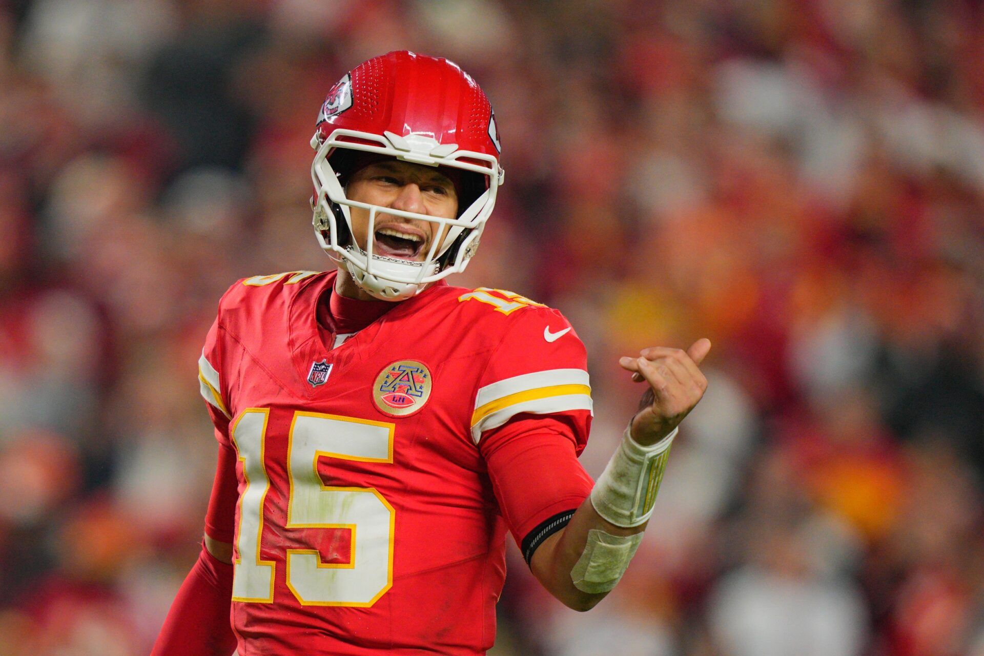Kansas City Chiefs quarterback Patrick Mahomes (15) reacts during the third quarter of the game against the Washington Commanders at GEHA Field at Arrowhead Stadium.