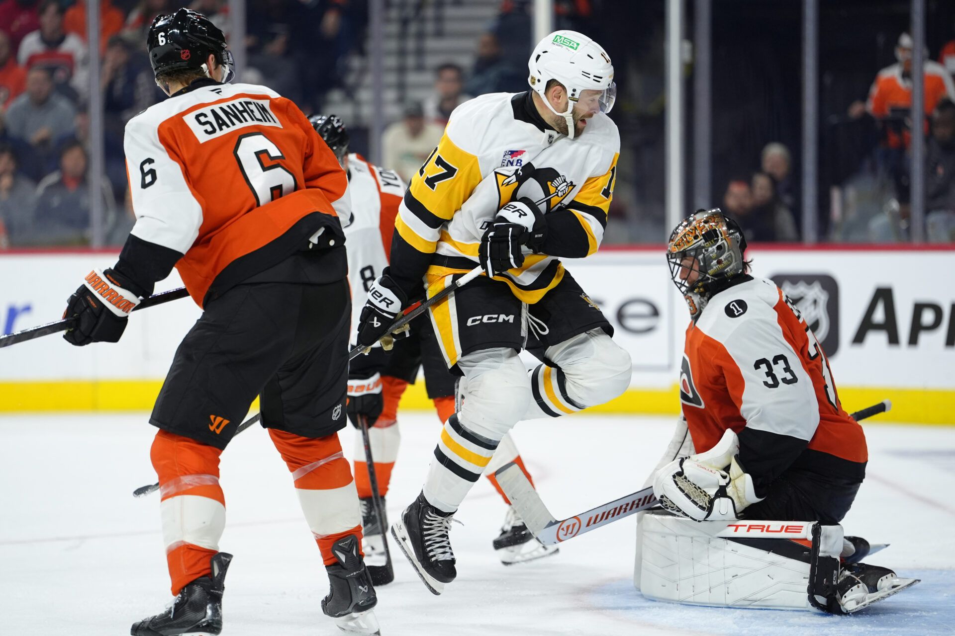 Pittsburgh Penguins right wing Bryan Rust (17) avoids a shot against the Philadelphia Flyers in overtime at Xfinity Mobile Arena.