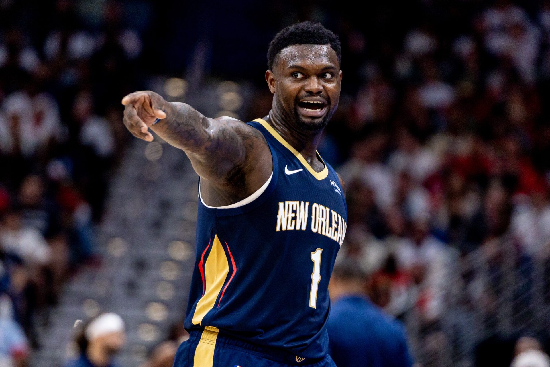 New Orleans Pelicans forward Zion Williamson (1) reacts to a play against the San Antonio Spurs during the second half at Smoothie King Center.