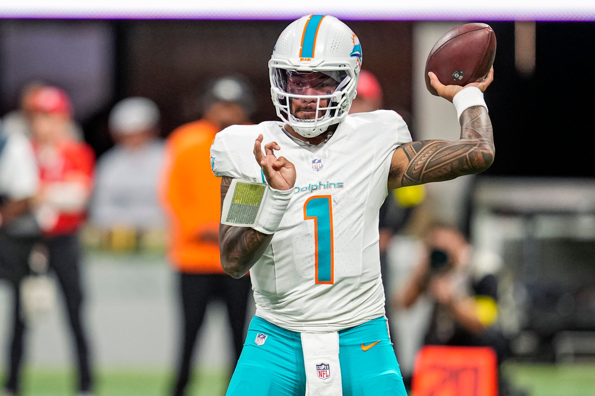 Miami Dolphins quarterback Tua Tagovailoa (1) passes the ball against the Atlanta Falcons during the first half at Mercedes-Benz Stadium.
