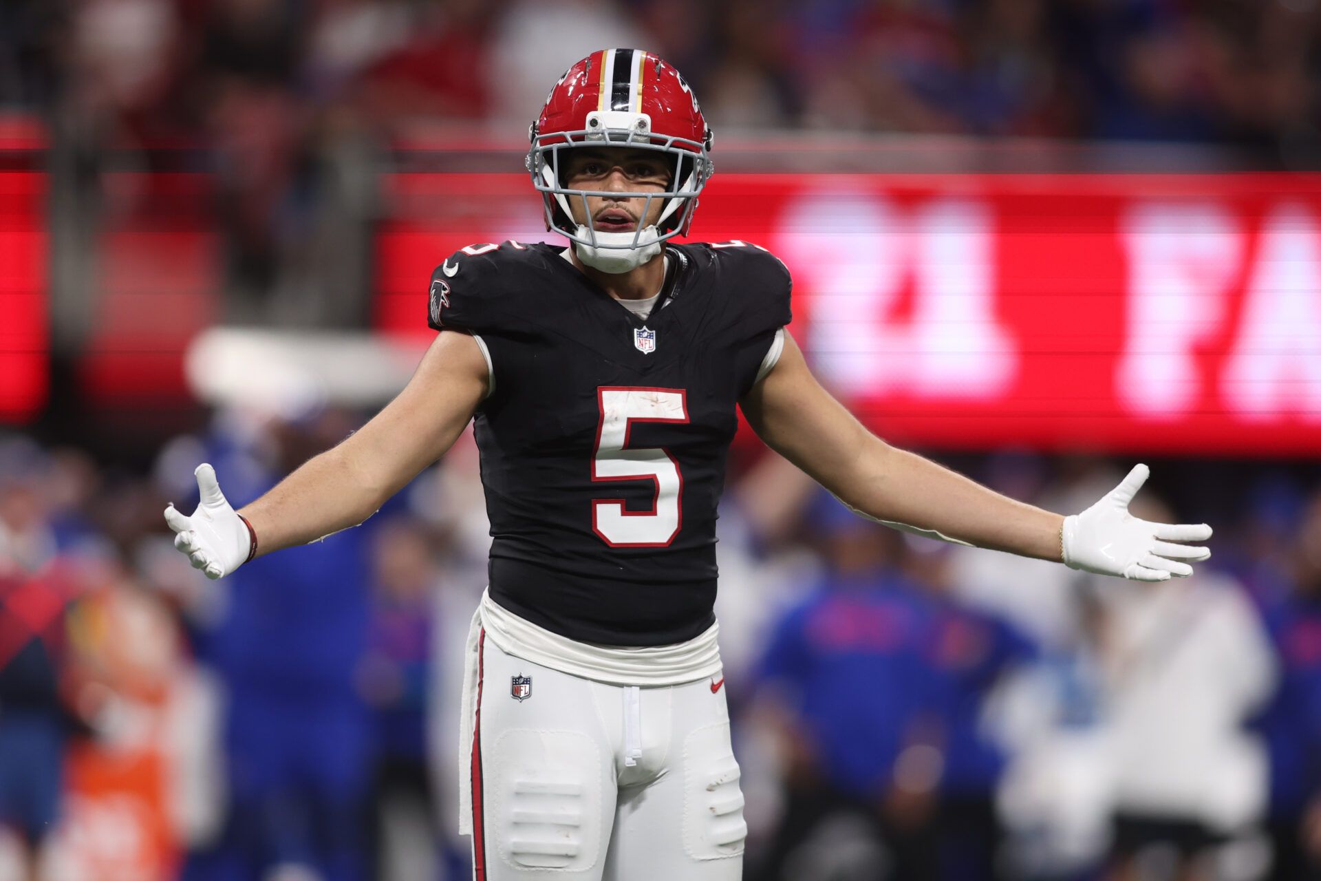Atlanta Falcons wide receiver Drake London (5) reacts after a pass interference call during the second half of a game against the Buffalo Bills at Mercedes-Benz Stadium.