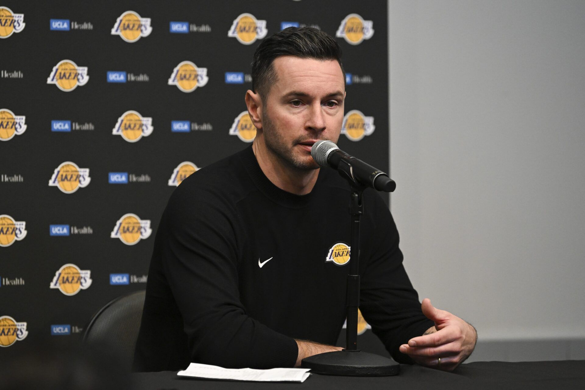 Los Angeles Lakers head coach JJ Redick speaks to the media after the preseason game against the Golden State Warriors at T-Mobile Arena.