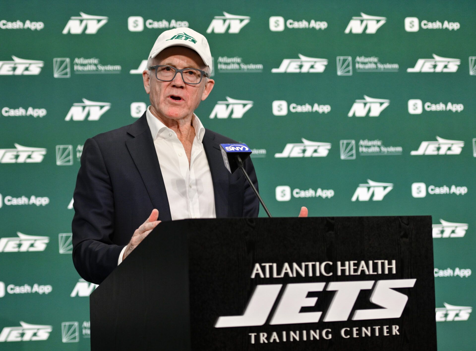 New York Jets owner Woody Johnson speaks during an introductory press conference at Atlantic Health Jets Training Center.
