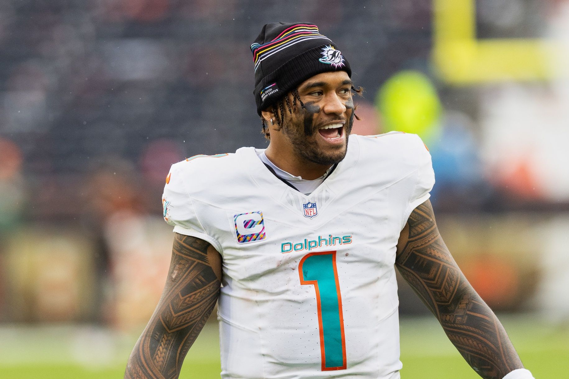 Miami Dolphins quarterback Tua Tagovailoa (1) reacts while walking off the field after the game against the Cleveland Browns at Huntington Bank Field.