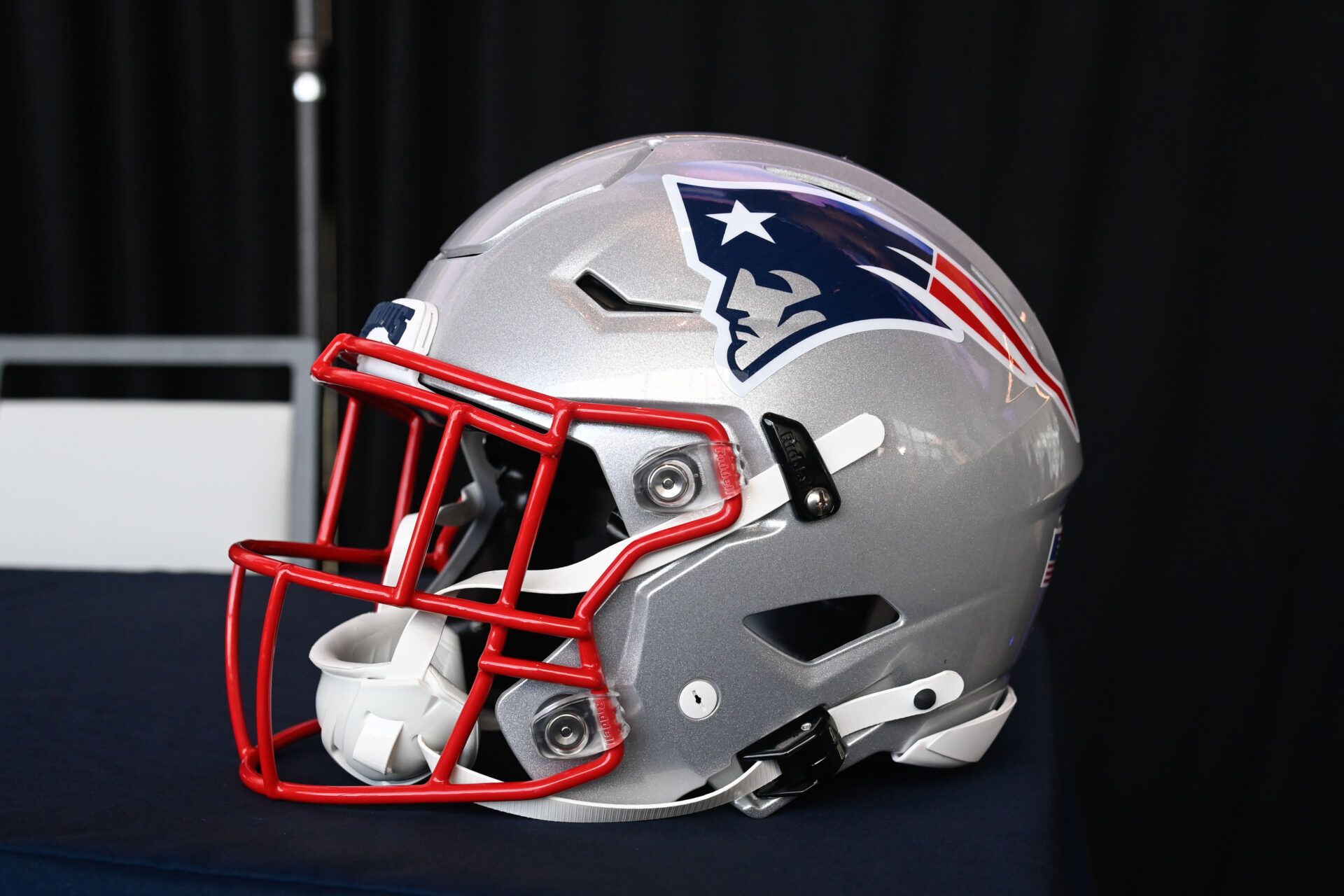 A New England Patriots helmet sits on a table at Gillette Stadium.