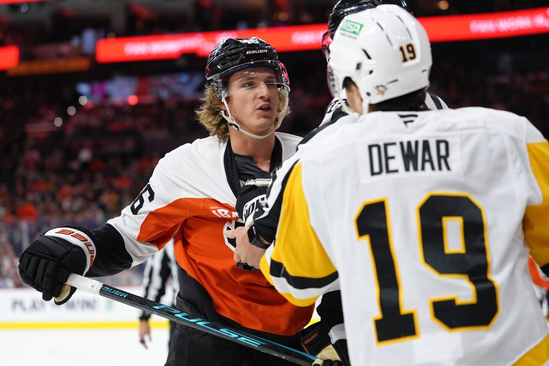 Philadelphia Flyers center Trevor Zegras (46) reacts against Pittsburgh Penguins center Connor Dewar (19) in the third period at Xfinity Mobile Arena.