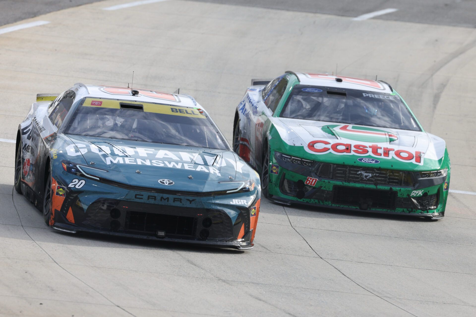 NASCAR Cup Series drivers Christopher Bell (20) and Ryan Preece (60) during the Xfinity 500 at Martinsville Speedway.