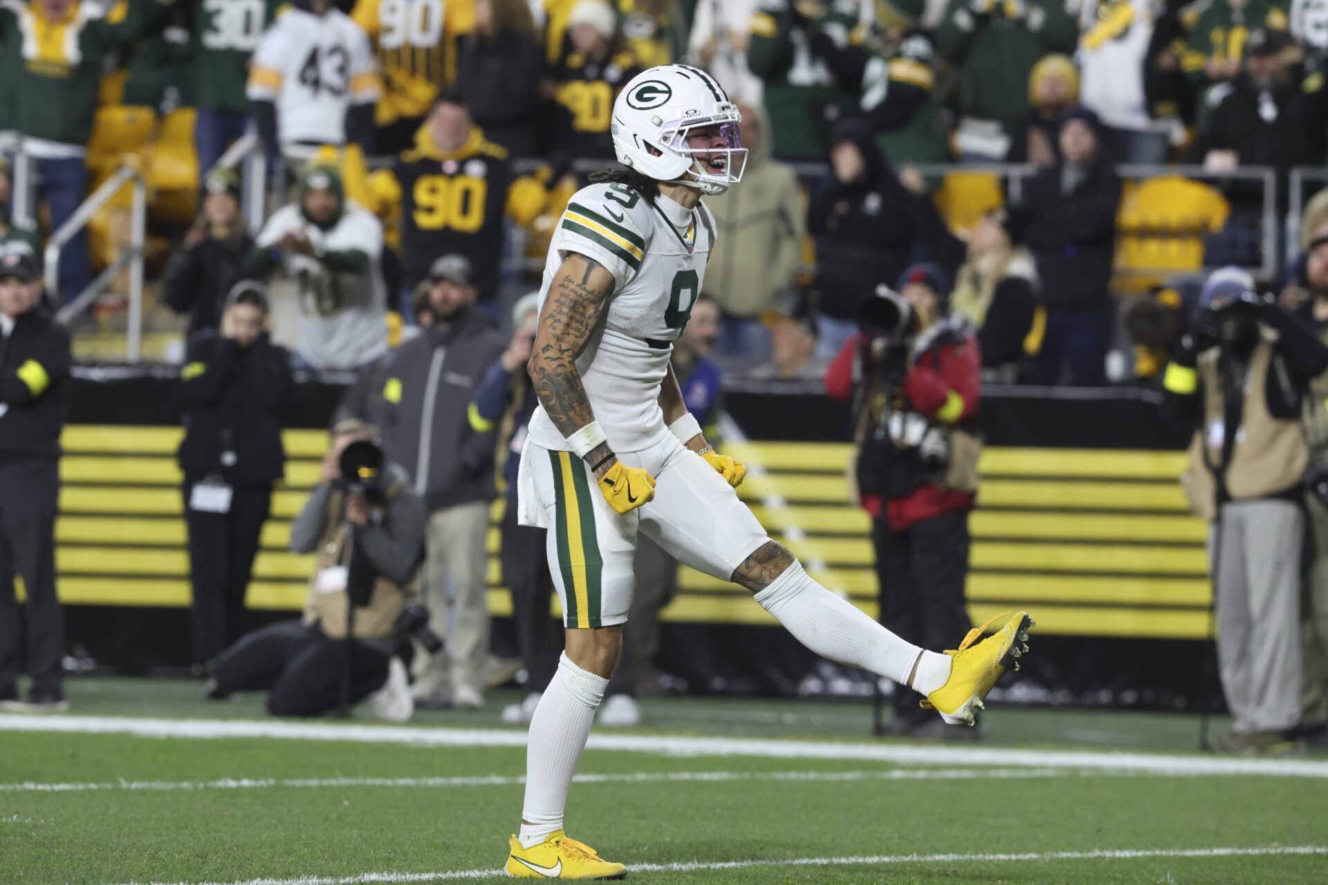 Green Bay Packers wide receiver Christian Watson (9) reacts during the third quarter against the Pittsburgh Steelers at Acrisure Stadium.