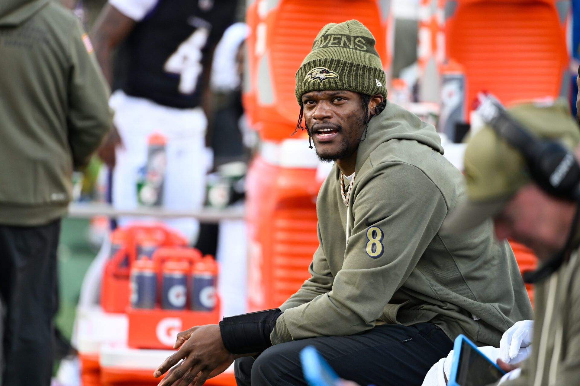 Baltimore Ravens quarterback Lamar Jackson (8) looks on from the sideline during the fourth quarter against the Chicago Bears at M&T Bank Stadium.