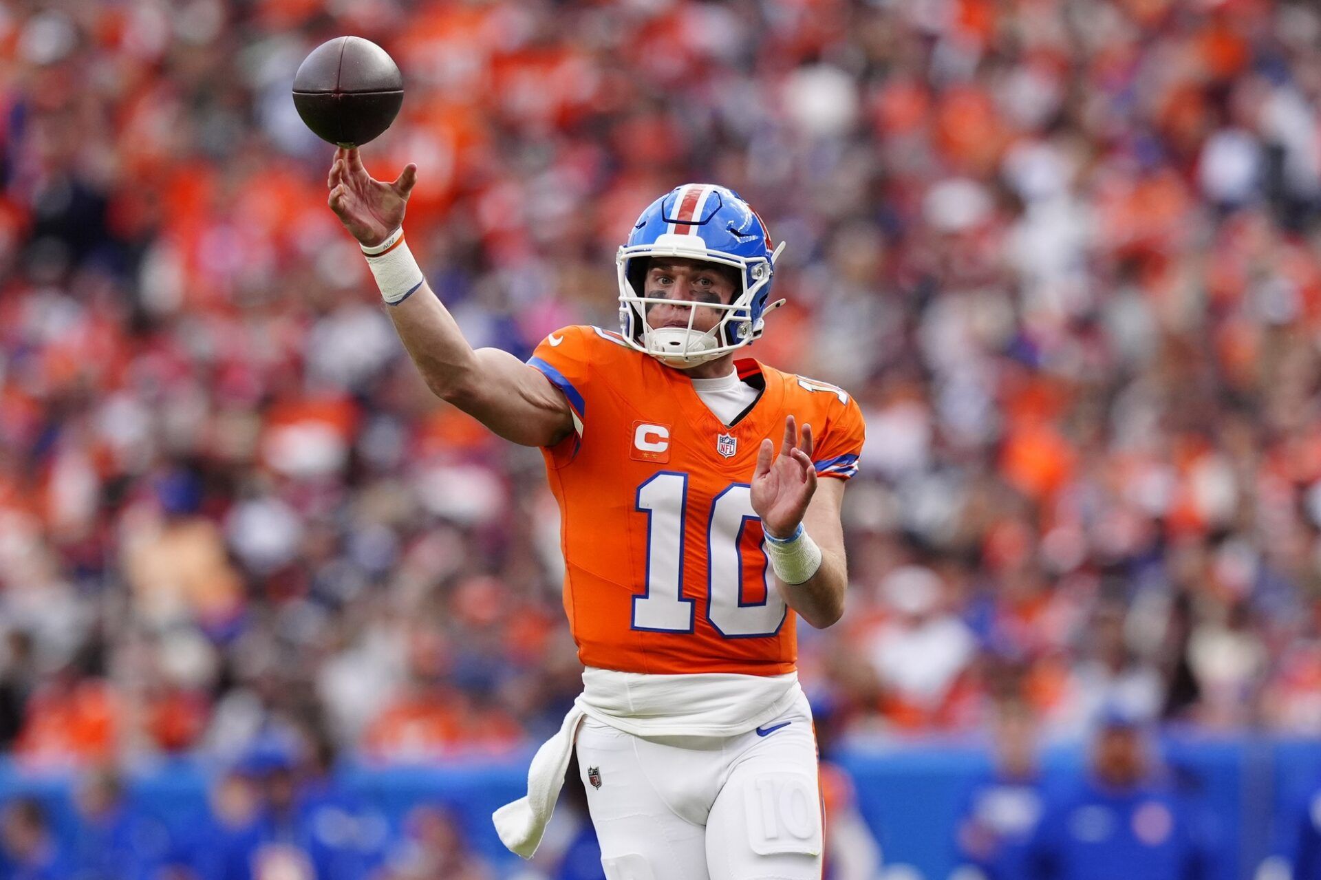 Denver Broncos quarterback Bo Nix (10) throws a pass against the Dallas Cowboys in the fourth quarter at Empower Field at Mile High.