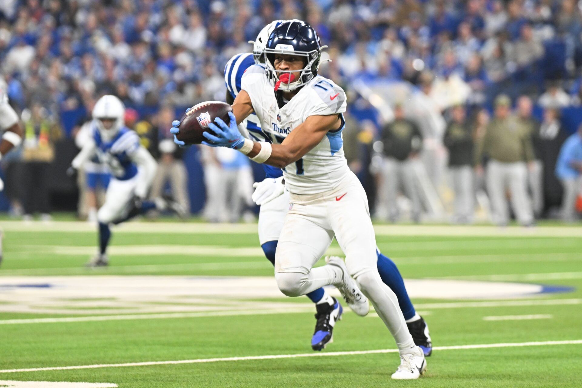 Tennessee Titans wide receiver Chimere Dike (17) makes a catch during the second quarter against the Indianapolis Colts at Lucas Oil Stadium.